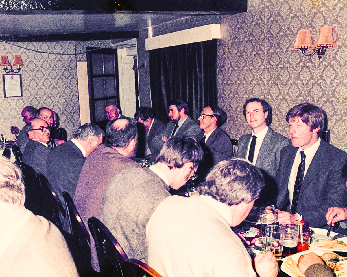 Lorraine Fletcher sees Arthur Wilding right at the back. Matthew Taylor identifies Alan Roberts, Brian Evans (nickname "Yanto"), Arthur Jones, Pat Taylor and Raymond Roberts, sat along the wall. Jo Betts adds "Albert Purslow on left, with spectacles on." (Courtesy Joe Lyons)