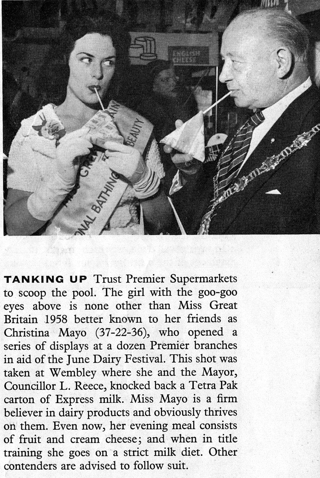 1959 Christina Mayo, Miss Great Britain 1958, opens displays at Premier Supermarkets during the June Dairy Festival. (Express News October)