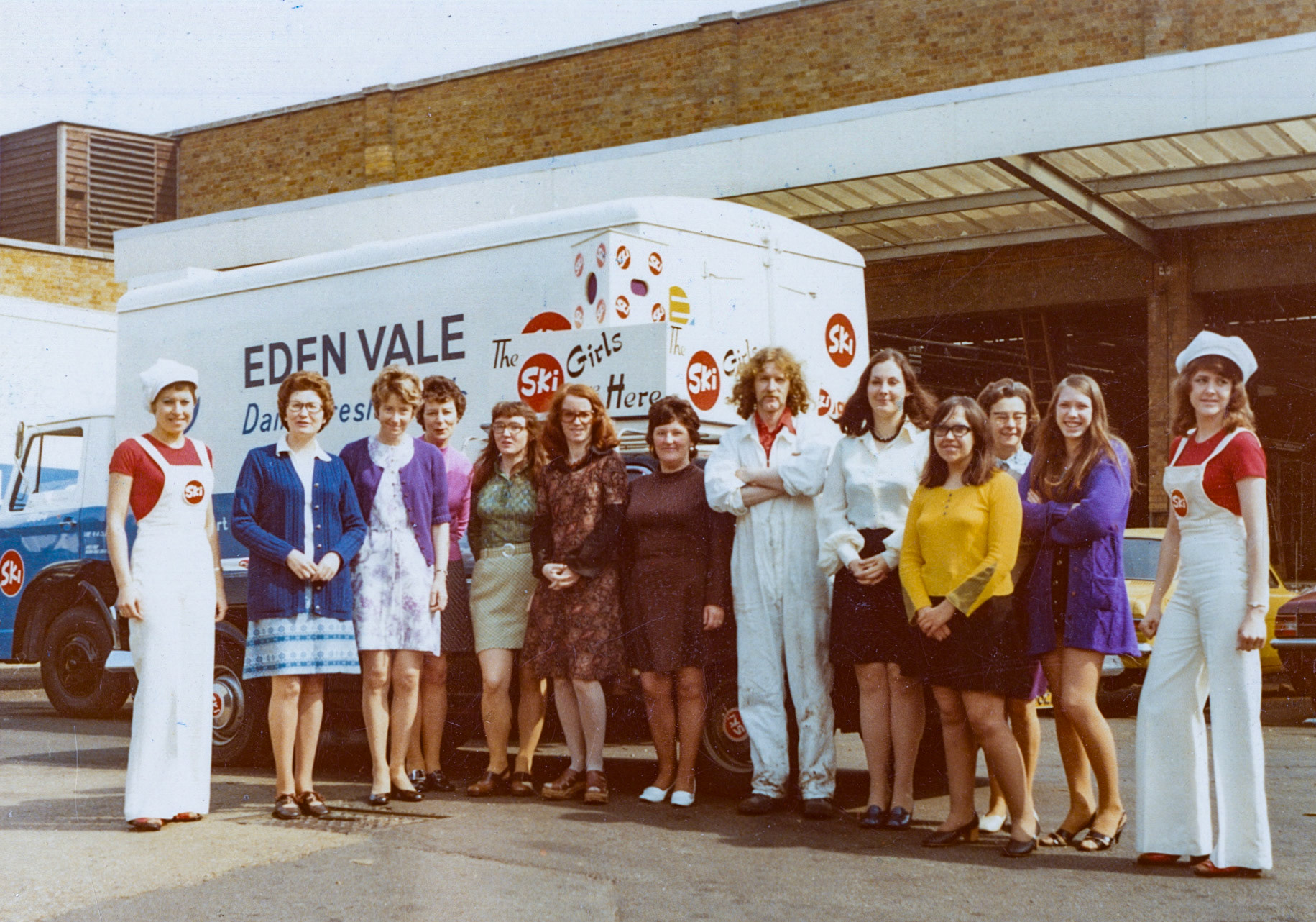 1972/3 'The Ski Girls are Here'-Eden Vale office staff and one of the van loaders, South Ruislip. Pat comments "Second left is Mary, 4th Reene, Maureen, Sue. Tenth from left Doreen, Rose, Pat Furness, Denise [John Parden's Secretary]" (Courtesy Pat Furness)