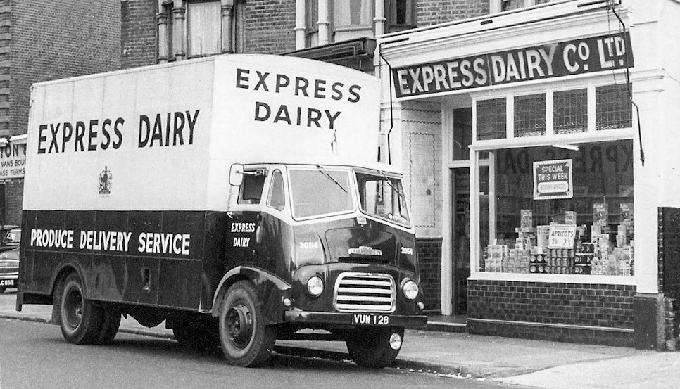 1950's Express Shop. Roger Frost comments "That’s a 7 ton BMC FE used for deliveries to the retail shops. It would have had a double deck body with a tail lift. Express Dairy were, I believe, one of the first companies to use a double deck vehicle like this at that time. Hard to estimate the actual year, the FEs were produced from the mid to the late 1950s. I will estimate that it’s between the years 1958 and 1962.