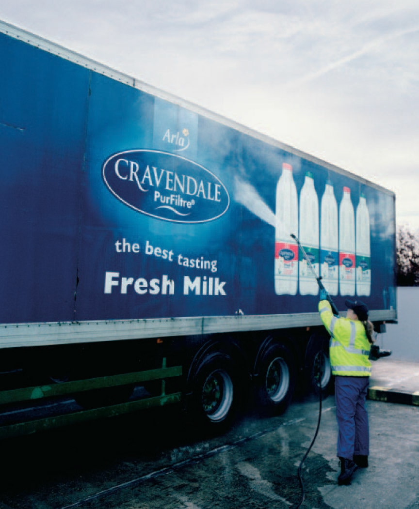2003 Arla Foods report illustrates a trunker being washed with Cravendale PurFiltre advertising. (Extract from Arla Foods Annual Report)