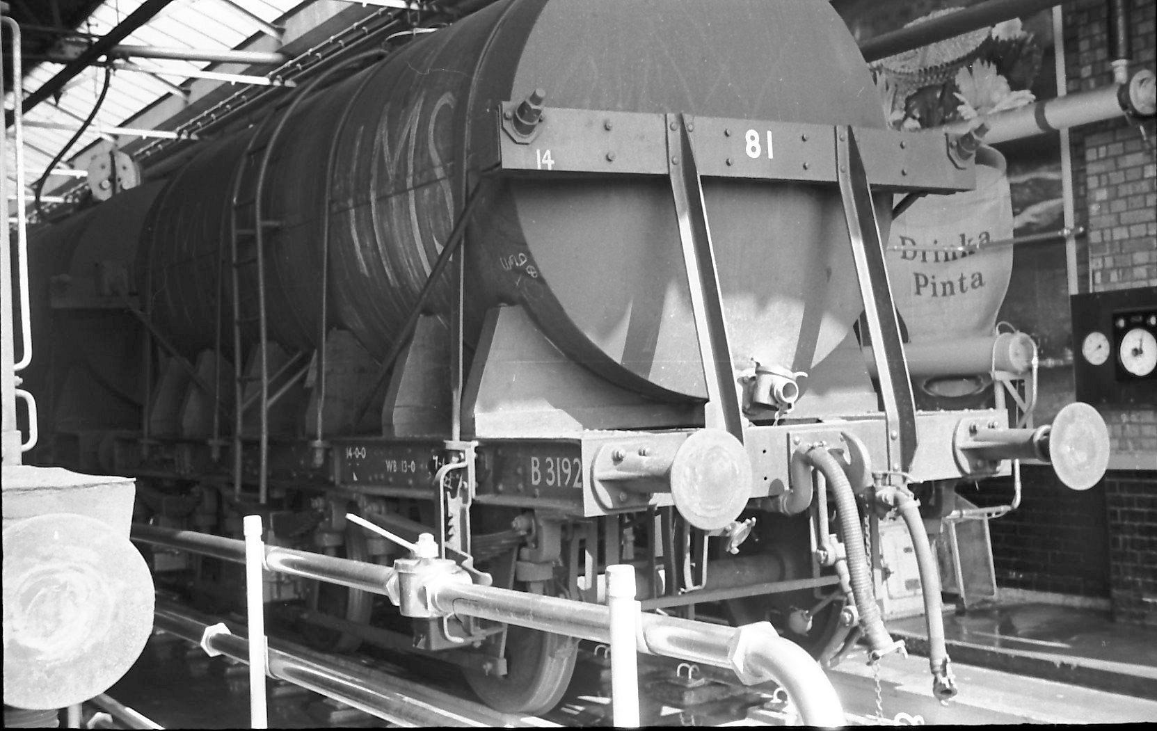 1970's IMS tank at South Morden dairy rail siding. Matthew Pinto comments "GWR Diagram 056 in post-nationalisation IMS livery".