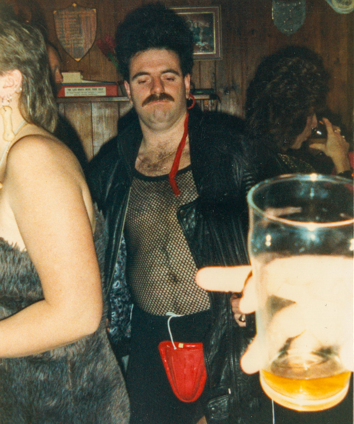1988 Honiton staff (Chris Jarvis) celebrate the first Red Nose Day, Fountain Head Inn, Branscombe, Devon. (Courtesy Tim Pearce)