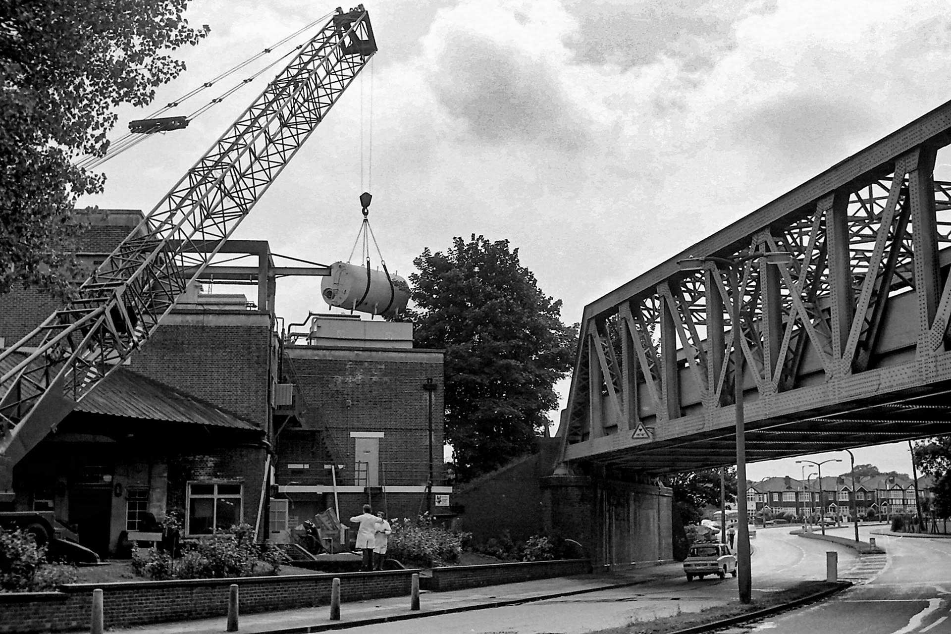 1979 South Morden-new bulk detergent tank installation. Peter Roper comments "I think John Tait, Project Engineer and Tony Evans, both in white coats". (Photographer Sam Jones)