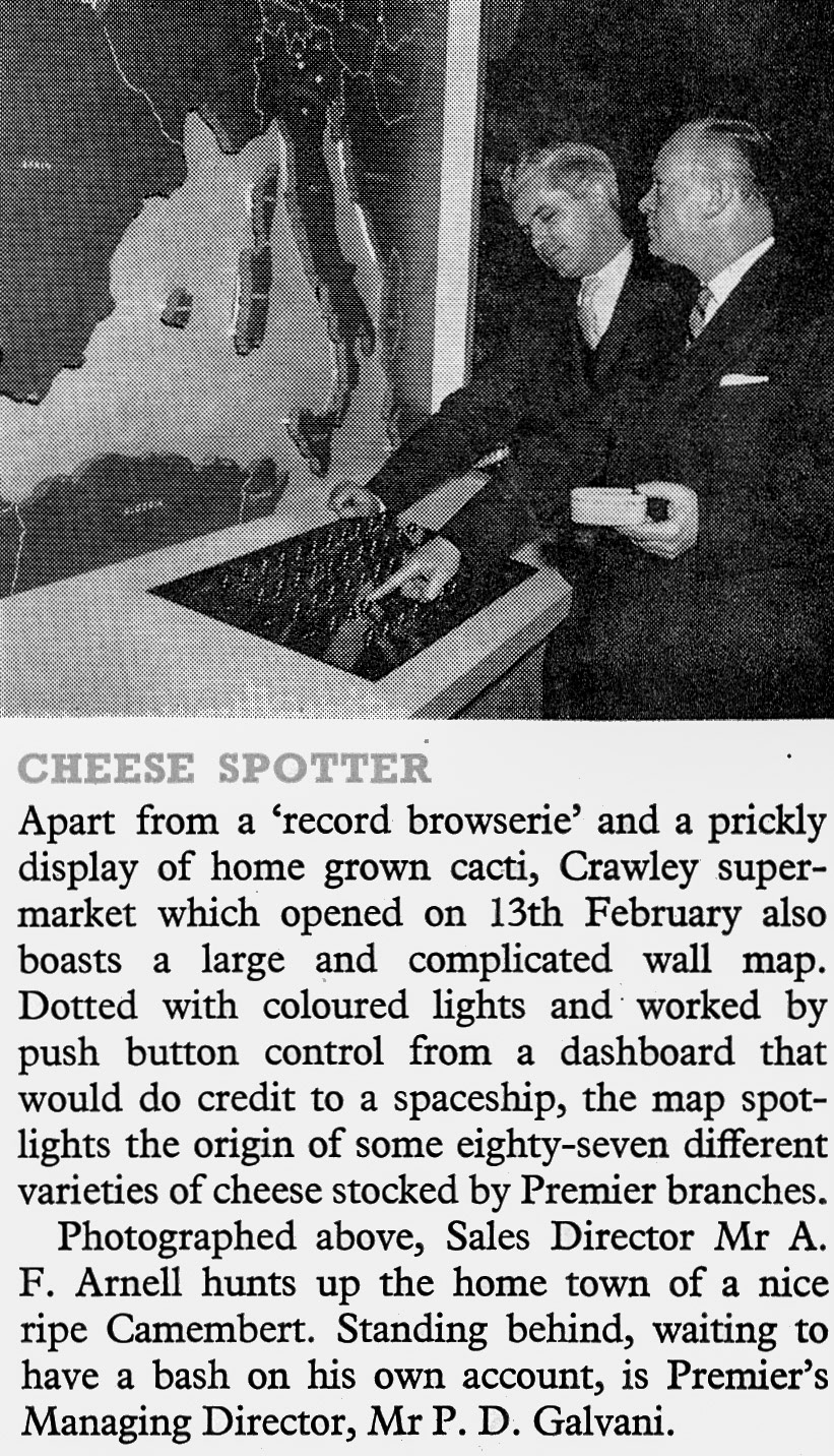1958 Crawley supermarket has an illuminated wall map showing the origin of the 87 cheese varieties that it stocks. Sales Director A.F. Arnell and P.D. Galvani demonstrated. (Express News July)