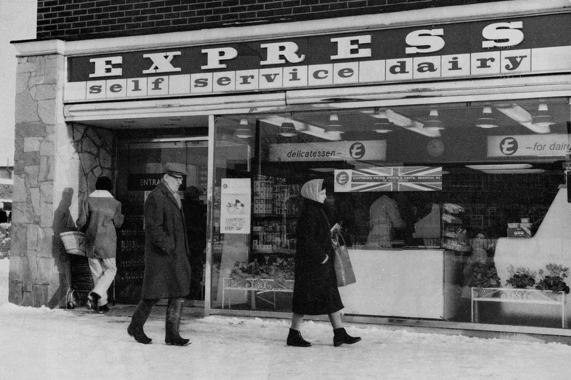1968 Part of a 'Backing Britain' campaign, where Express pegged their prices for 6 months because of a national financial crisis. See the shop sign "Express Pegs Prices until 31st March" in the shop window. (Express News Spring)