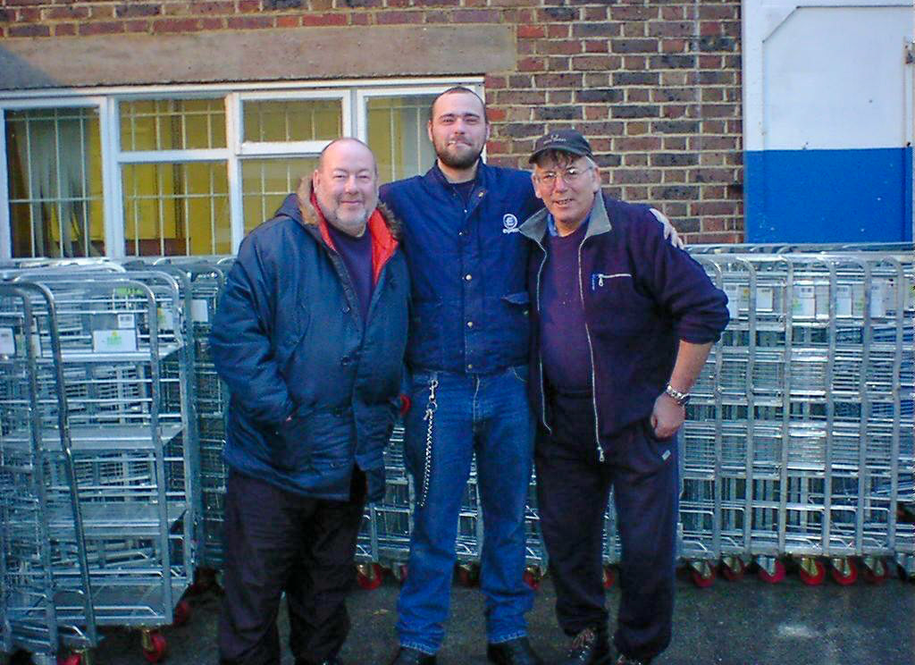 1980's Michael Aldread identifies Bloomsbury Depot, with left to right: Dave Luxford, Richard Luxford and Dave MacTagget (milk checker). Wayne Aldread adds "I have memories of this depot, as I spent most of my Saturdays helping my brother on a milk round." (Courtesy Michael Aldread)
