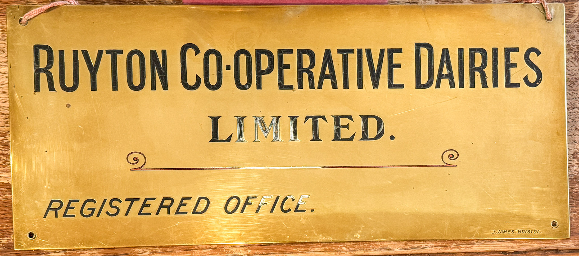 2025 Hall Farm, Ruyton-original polished brass plate engraved with Ruyton Co-operative Dairies Limited, Registered Office.