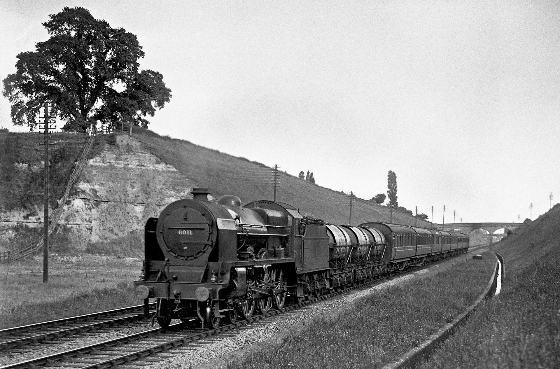 1934 Appleby empties returning hauled by LMS 5XP Patriot 4-6-0 No 6011 near Nottingham London Road Junction. (Courtesy T.G. Hepburn/Rail Archive Stephenson)