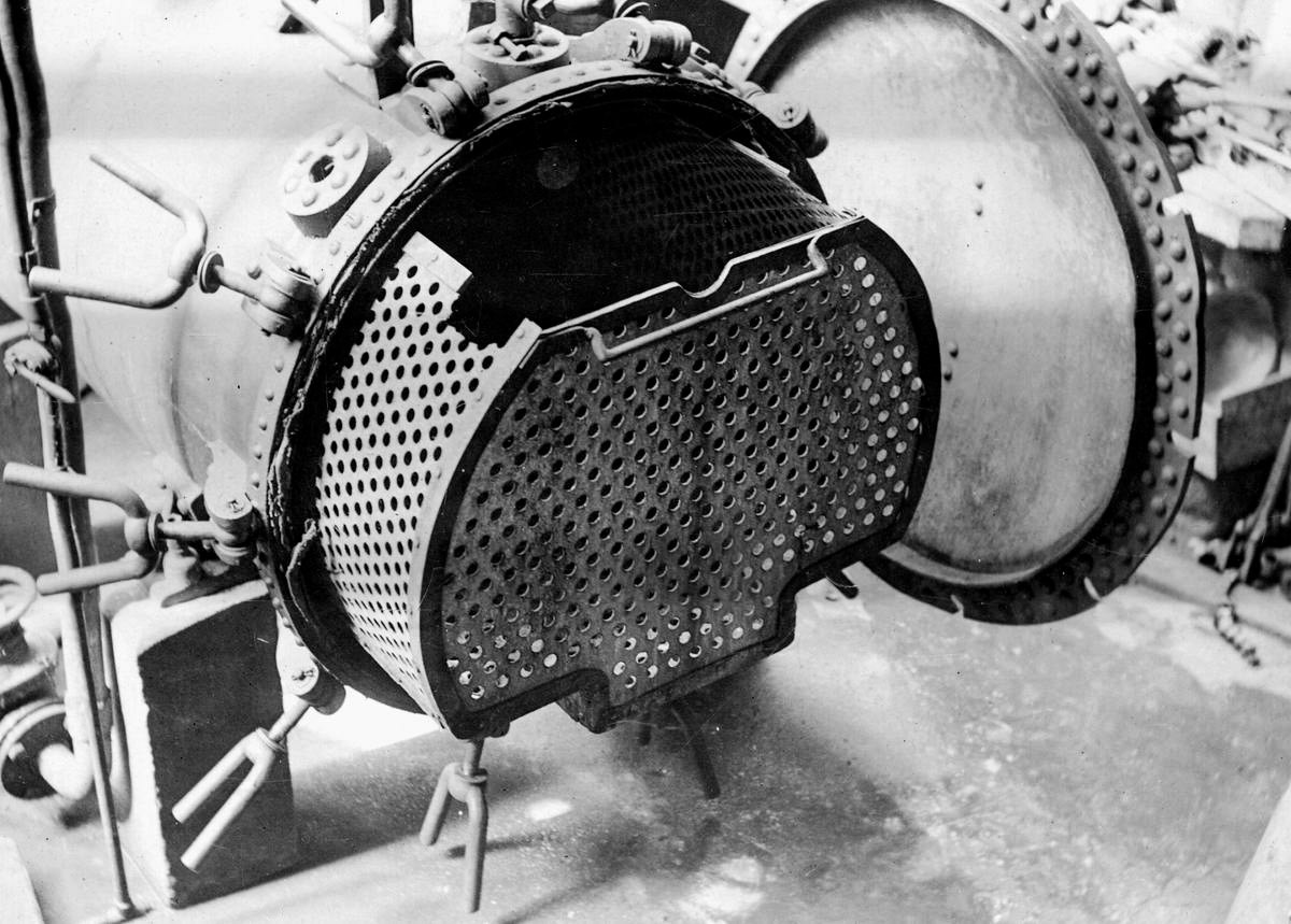 1926 Burgess Creamery interior, Gartside Street, Manchester. Keith Goodby suggests "This is a retort for in-bottle sterilisation, it looks similar to the ones we had at Birmingham Dairies." (Image courtesy of Manchester Libraries)