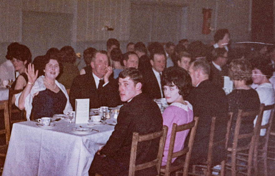 1960's Minsterley Creameries Social Club “Do” or Union Dinner. Ben Samuels commented "Mrs Abby waving and her husband Paddy next to her." Janice Davies adds "Sandra McGregor in the pink dress and Richard McGregor sitting by her on the end. I can also see Liz Williams nee Carswell sitting in the background, behind the lady who is waving. (Joe Lyons Collection)