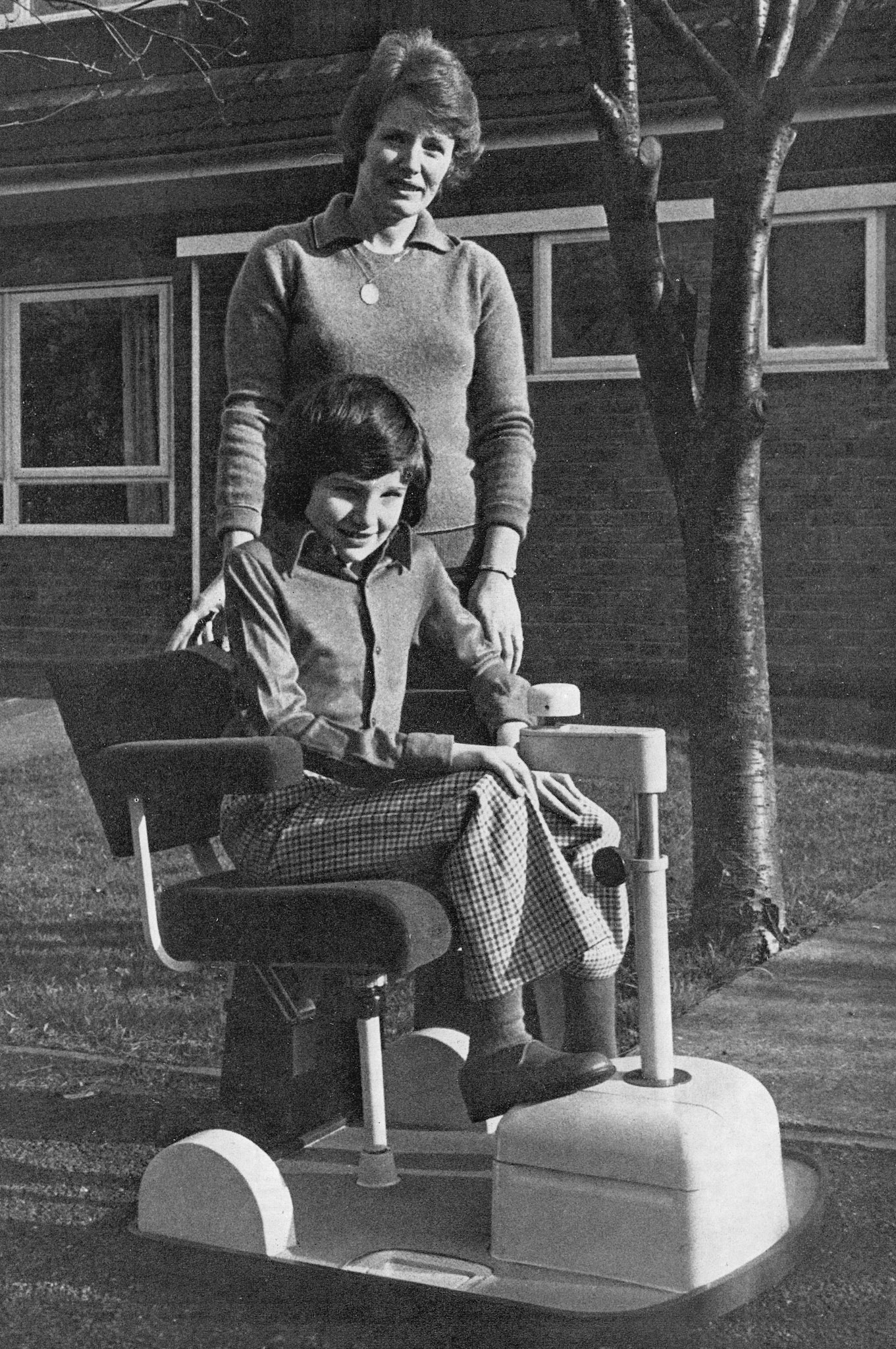 1976 Welwyn retail depot charity raising money to buy 'Chairmobiles' - John Boarder and his mother Dawn.