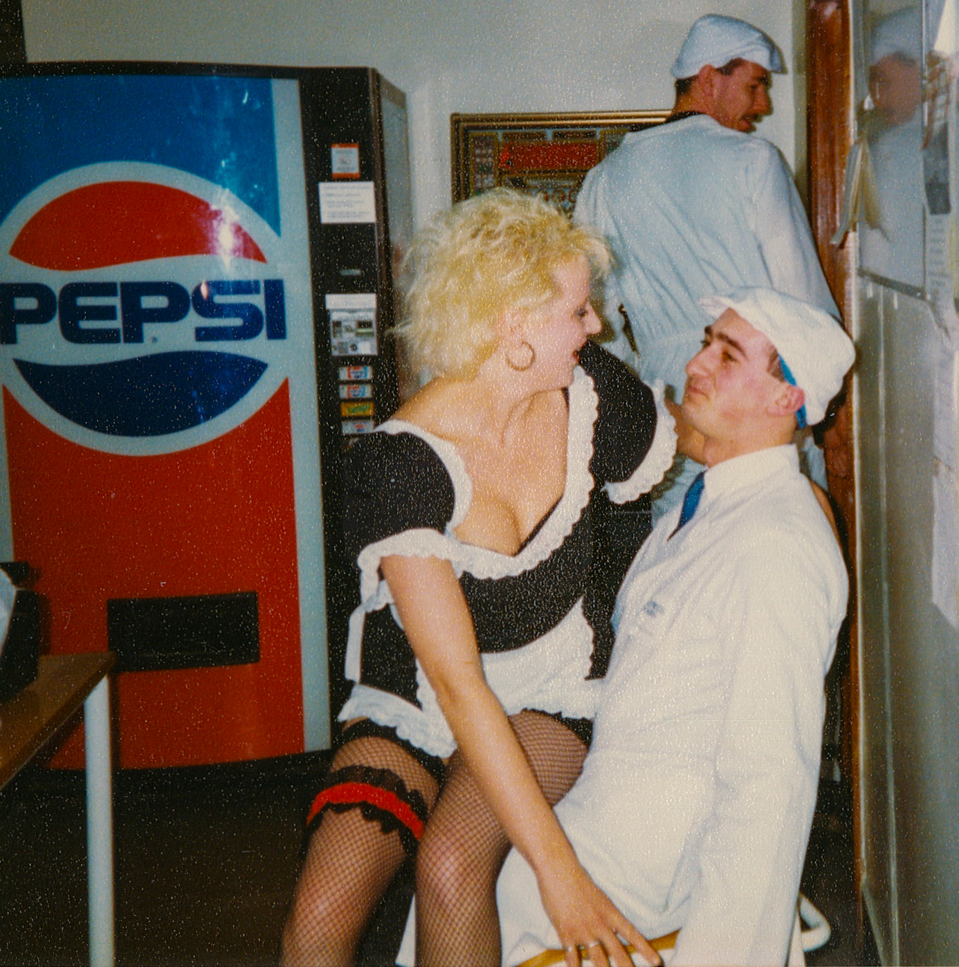 1991 Honiton, January 8th: Donal Cronin's Birthday Kissogram, Andy Rose in the background.  (Courtesy Wendy Hawker)