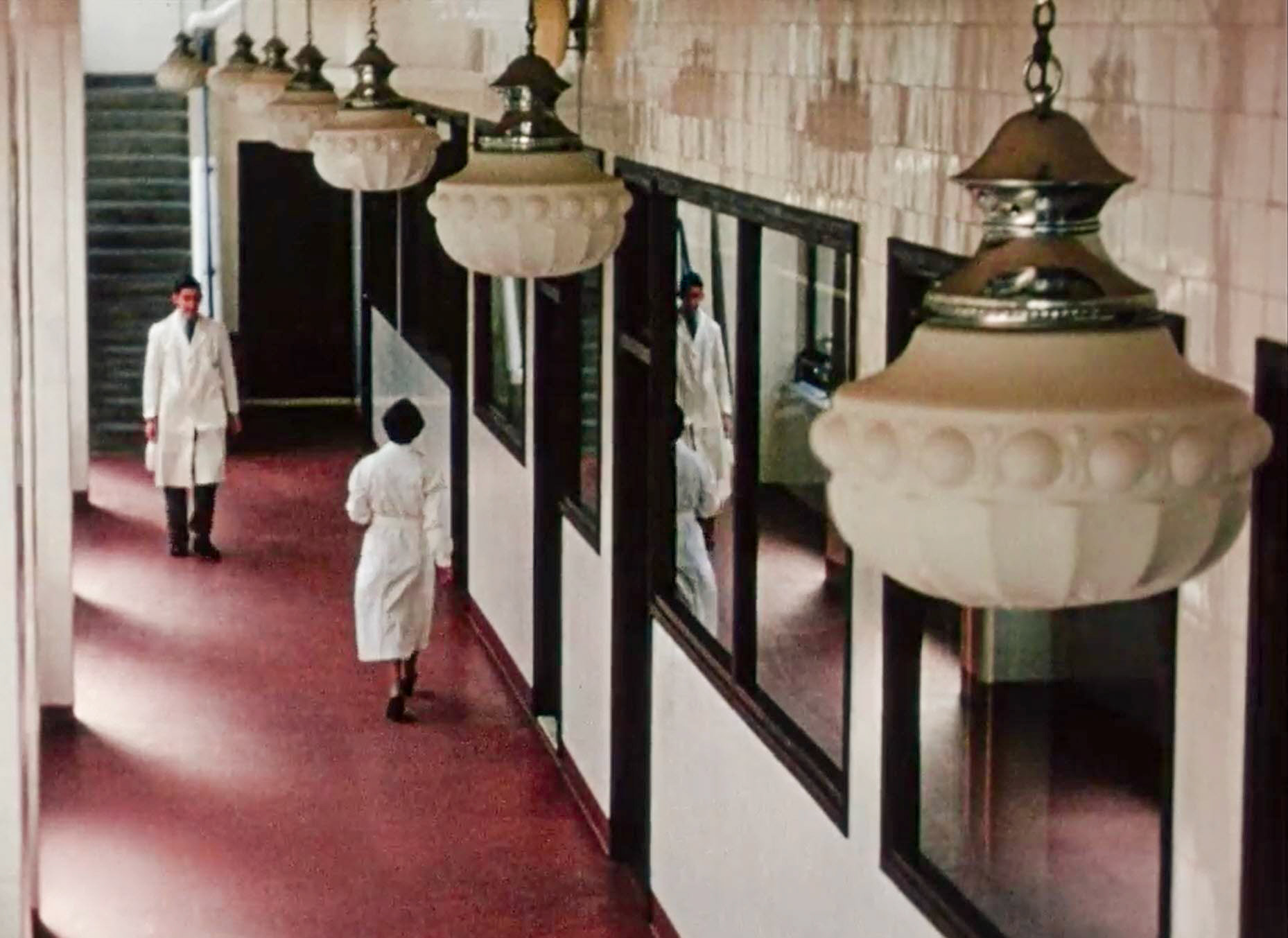 1954 South Morden Processing-the main mezzanine corridor overlooking the bottling lines, with the laboratory on the right. (Stills from Express Dairy Film)