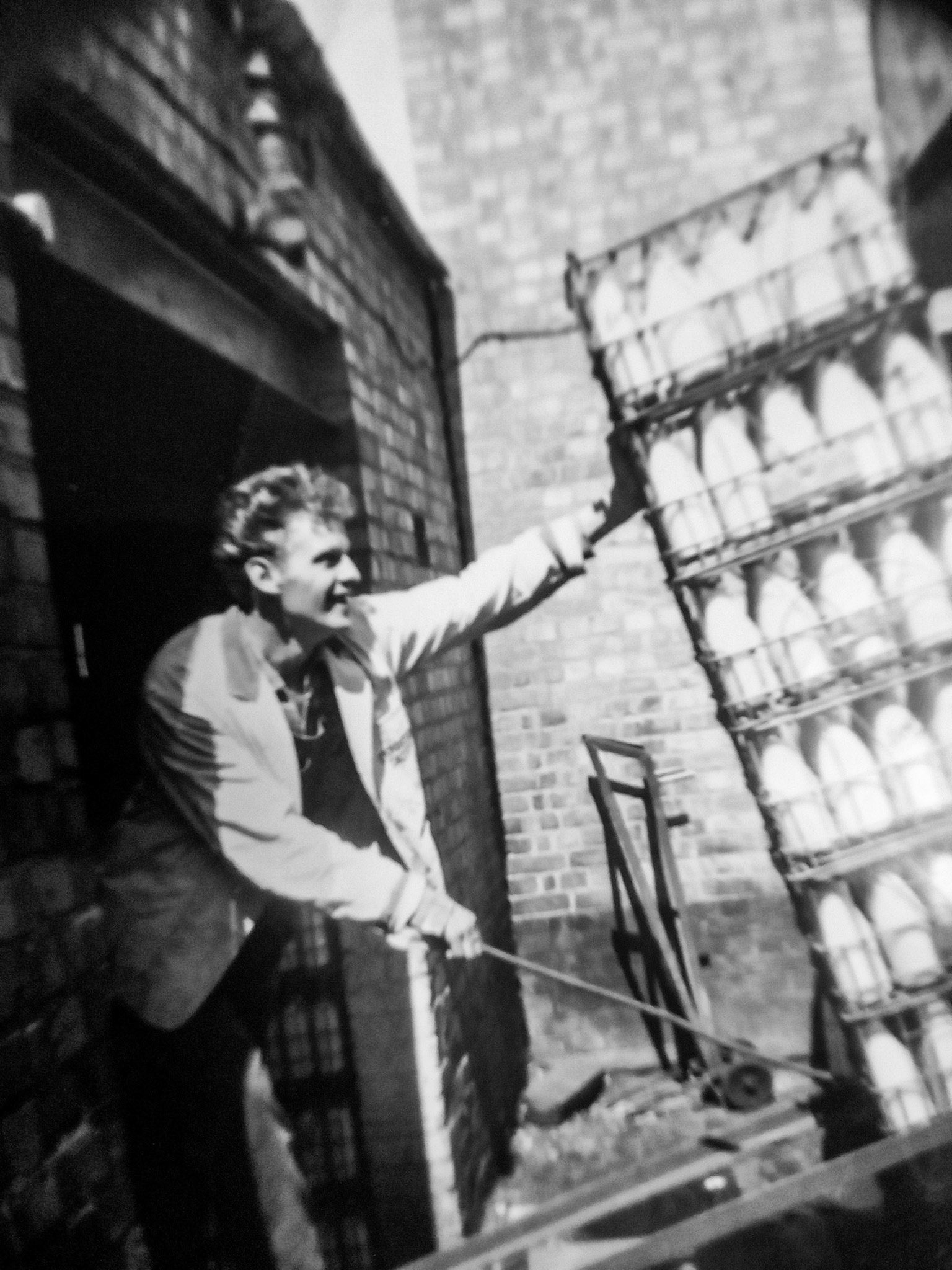 1960's Mick Culverhouse unloading a Cricklewood delivery, photo courtesty of Victoria Culverhouse from Facebook