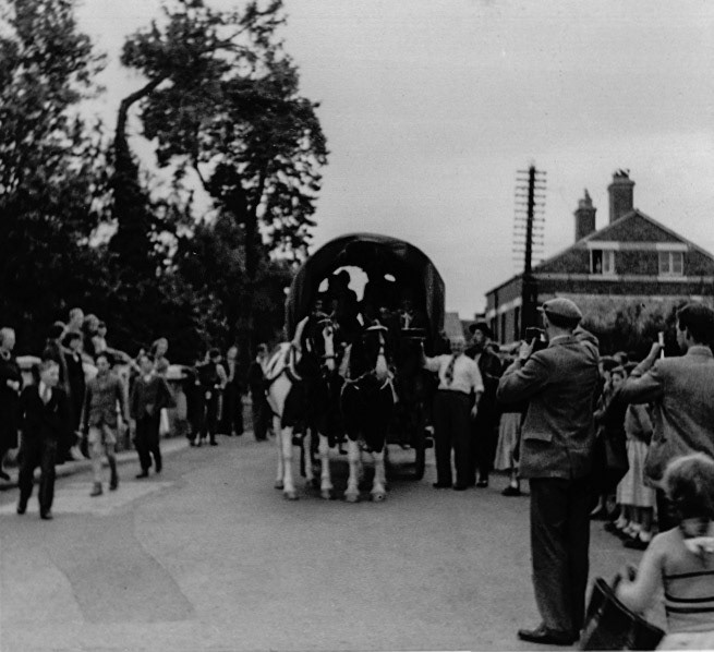 1953 Harry Evans recognises this as outside the Bridge Hotel, en route to a BBQ at Linley Hall, where the cooking was done by American servicemen. Ev Griffiths comments "That’s my Dad Harry Stevens holding the horses reins, and Uncle Bob in the middle in the cart." Harry Evans adds "My dad is on the wagon on the left of Bob, as you look at it." Mary Worrall adds "Jim Worrall, in white shirt, holding horse;Jim was landlord of the Bridge Hotel" (Courtesy Joe Lyons)