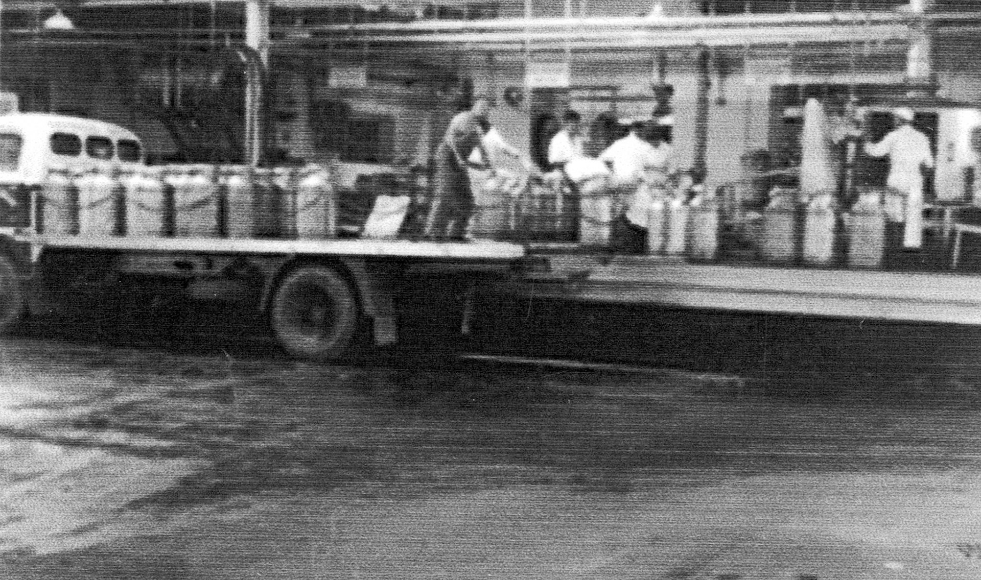 1960's Seaton Junction. Bert Moon comments "I remember putting on full churns on the chain that ran in circle, noisy! Started driving HGV with my Dad at Sidbury, went up to Farway, Northleigh, Southleigh." (Courtesy Allhallows Museum, Honiton)