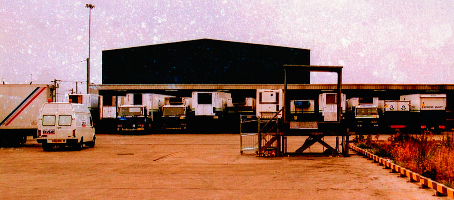 1980's Cricklewood Bottom Yard. Dave Fane comments "In the mid 1980s there used to be about a dozen Eden Vale vans parked on the left where the DAF van is. I imagine the platform on the right is where they unloaded the trunker with the dairy products for these vehicles." (Courtesy Dave Fane)