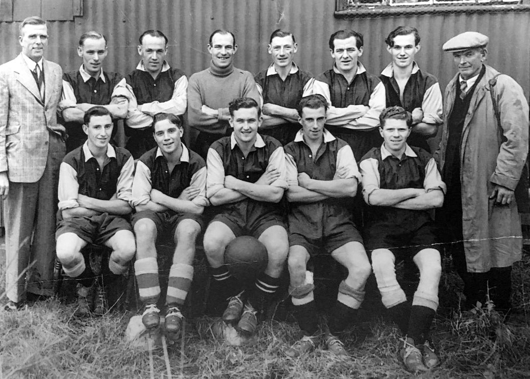 1950's Ruyton. John Guest commented in October 2022 "Today the village says goodbye to one of it's longest serving residents, aged 95. Alfred Dennis Corfield (always known as Den), was born in Frankwell on 27th December 1926 and was the youngest of 7 children. Whilst working as a bricklayer, Den came to Express Dairy on a job and this would lead to an opening for him at the dairy, which was the start of his long employment with the Company. When he came to Ruyton, he played for Ruyton Rovers and is pictured here, with the ball, front centre." Mike Betts adds "Third from the right, back row is Mr Arthur C Betts, a great man". (Courtesy John Guest, Ruyton Revisited FB Group)