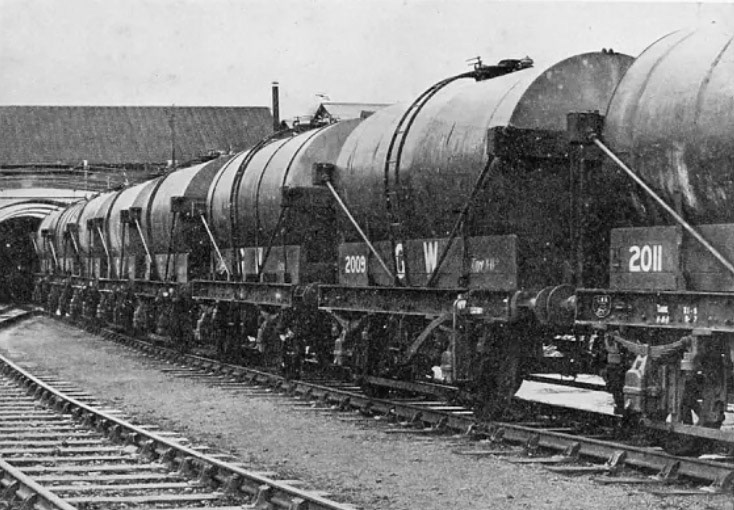 1929 Hygiene and speed, Milk Train Express. Matthew Pinto identifies "Wooton Bassett. The tanks are all matching GWR 4-wheelers so probably around the time of opening in 1927." (Illustration from 'The Milk Trade, A Comprehensive Guide to the Development of the Dairy Industry' edited by C Raison (Virtue, c 1933).