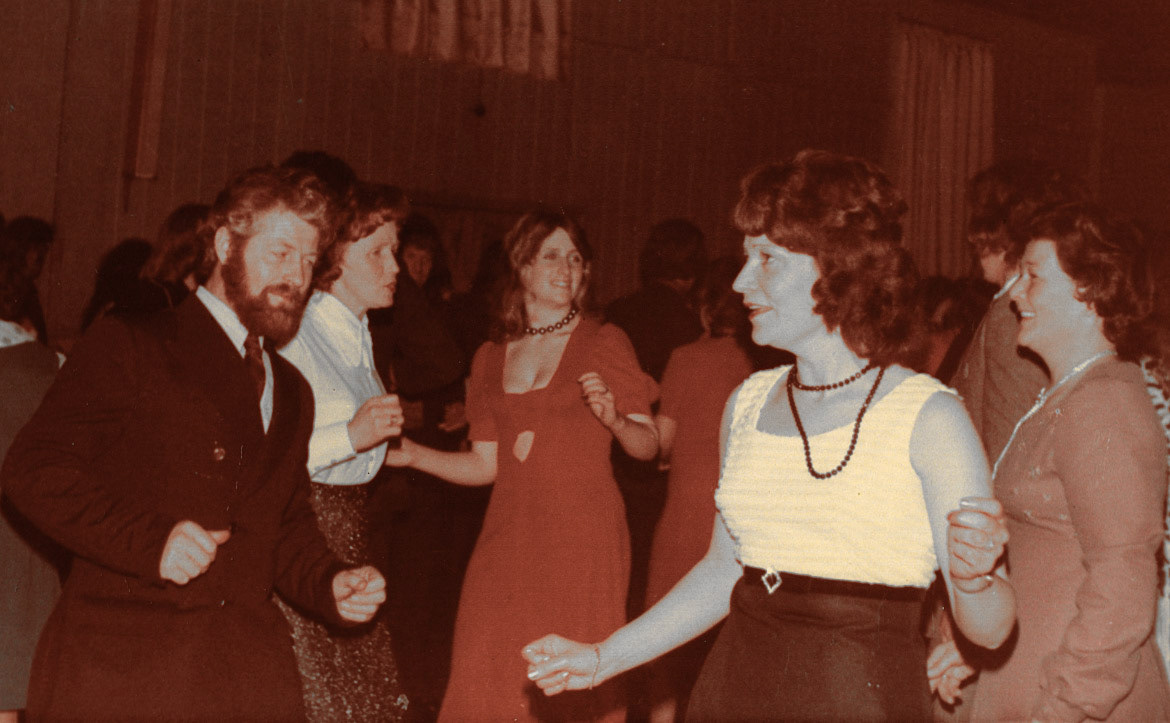 Betty Sayce comments "Oh my Goodness that’s me in the Red Dress 🫣 a long time ago, with Mum, Irene Sayce". John Potter adds "Bert and Joyce Walker at the front"  (Courtesy Joe Lyons)