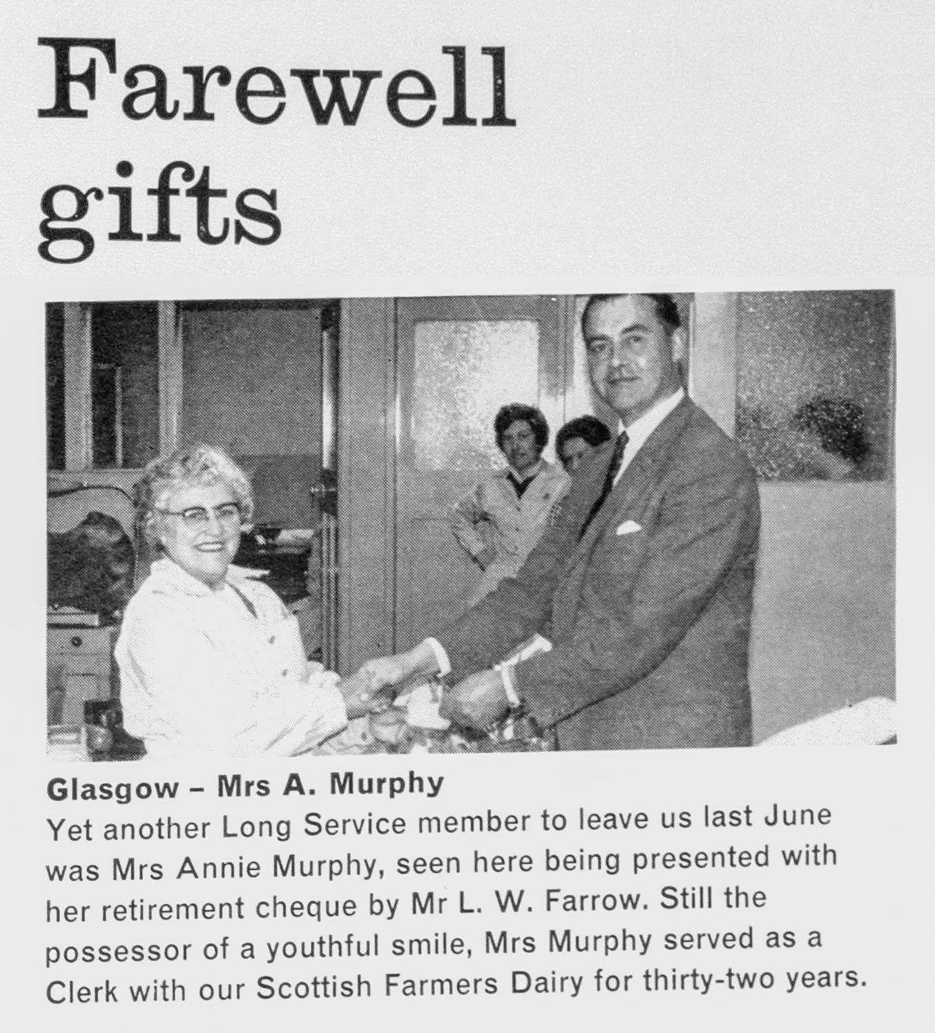 1962 Farewell gifts-to Mrs Annie Murphy, clerk at Scottish Farmers, who retires after 32 years,  being presented by Mr L.W. Farrow. (Express News Autumn)
