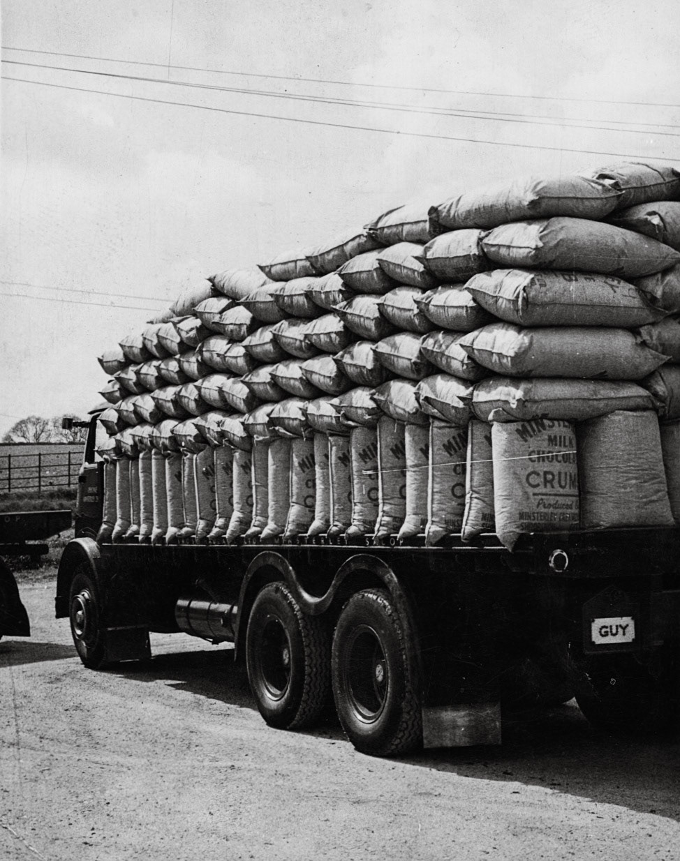 1950's Minsterley. Patrick Taylor comments "The chocolate crumb was used to make a product for Rowntrees, that department finished around 1962/3. The chocolate crumb was like chocolate fudge before it was baked and ground into powder. Often used to go down with Dad and get a bag 😛. Transport was Lewis Bros, their depot was next door to the Minsterley factory." Alec Liz Williams adds "My Dad Reg Carswell worked for Lewis Brothers" (Joe Lyons Collection)
