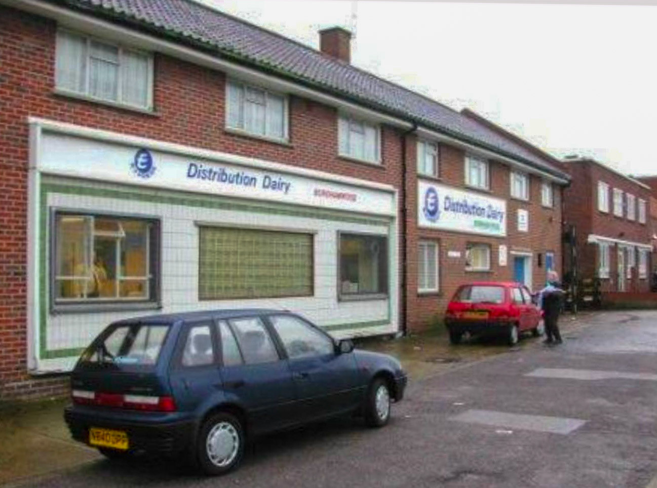 A1 Dairies, Whetstone Gary Page comments "First window was the mess room, second two windows were the office, last windows and door was the servery and the windows above were two 3-bedroom flats - I was living in the far one for a year. At the far end was where the floats drove in and the artics backed in the other end. It was also a driveway which led to the Co-op Depot next door. The lorries used to come in when they were the 38ft and drive right round, but when they changed them to the 42ft lorries they couldn't swing in so they changed it to the other end where they backed in to unload". (Courtesy Paul Simm)