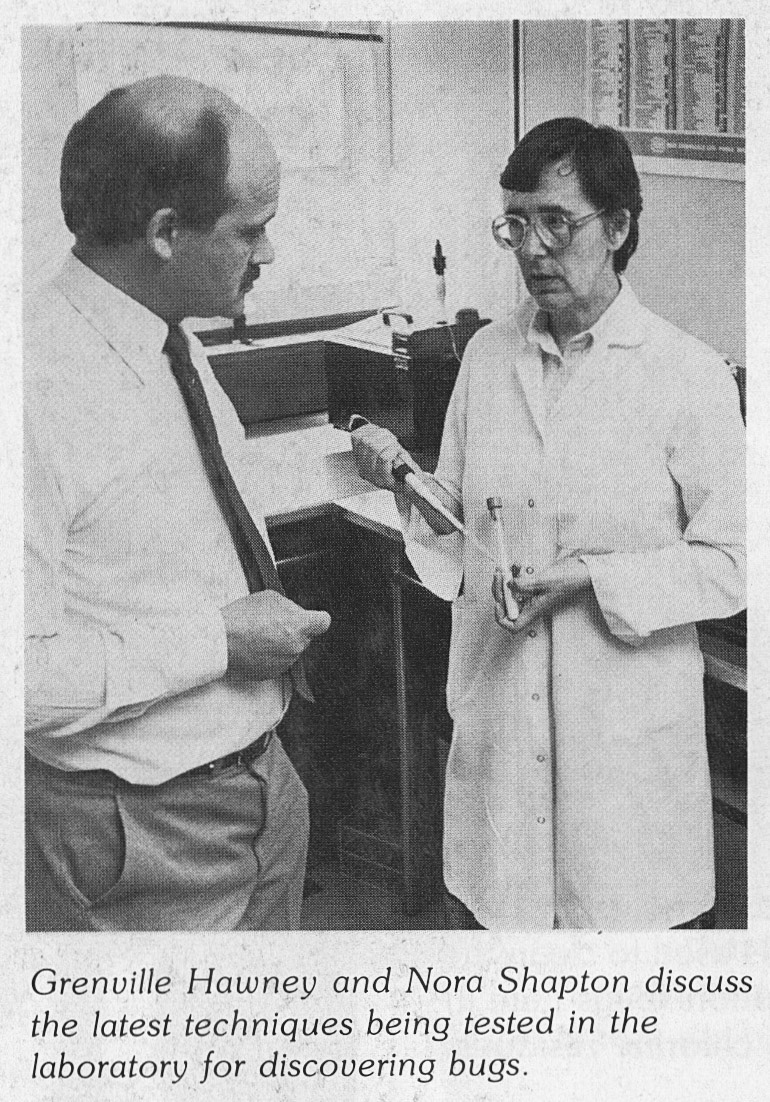 1983 Grenville Hawney and Nora Shapton discussing laboratory techniques