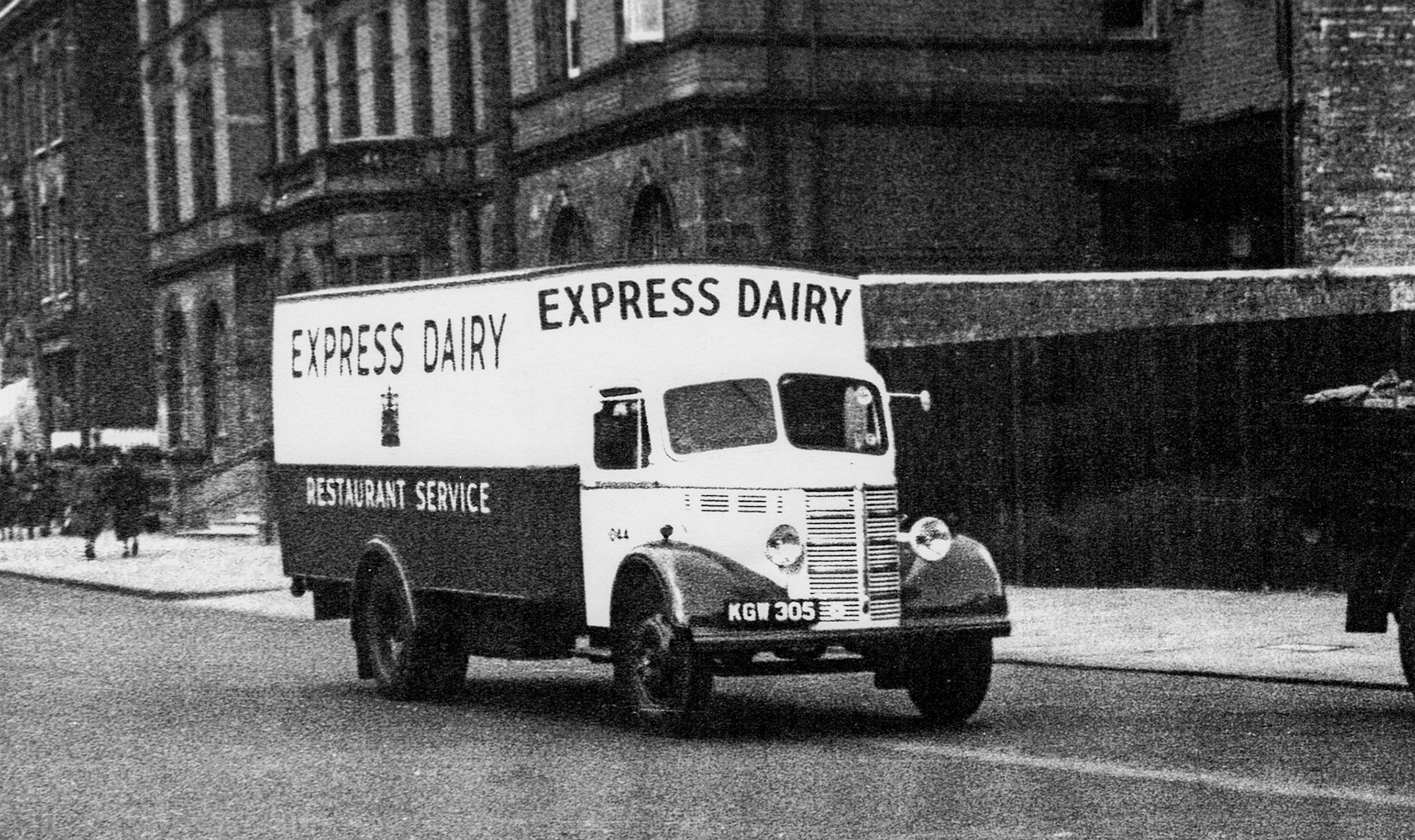 1950s Express Restaurant Service Rigid Truck. Reg: KGW 305, Co: 1044. Dave Fane explains that this was new in 1949 and sold in 1957. Roger Frost remembers "When we moved from the Express flat over the shop in Kentish Town to the one over the shop in Holloway, around 1950/51,  we used one of these as our removal van. I sat in the back with the furniture together with one of my uncles and my dad drove the van with my mum in the passenger seat. I remember the van had a light in the back which was left on during the journey and I sat on one of our armchairs. We stayed in the flat in Holloway until the company closed the shop in and sold the lease in 1966." (Courtesy Paul Luke)