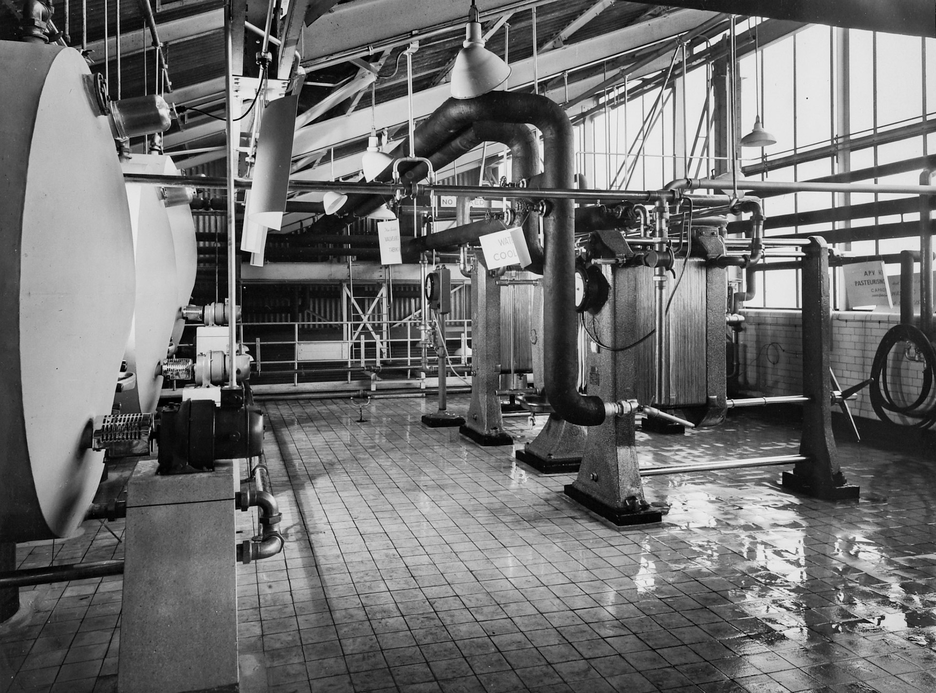 1950's Rowsley Dairy milk storage tanks and pasteurising/ cooling plant. (Courtesy Derbyshire Record Office, donated in March 1985; they had previously belonged to the donor's father, who was an electrical engineer with the dairy.)