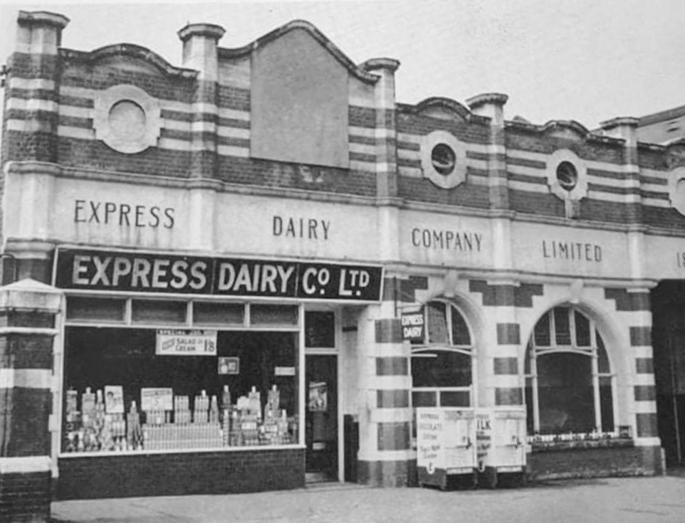 1950's? Herne Hill Shop and Depot  Stephen John Wills comments "Herne Hill depot had 26 retail and 1 semi-retail round, there was once a shop at front of building which became depot offices and servery, plus managers office. When the stables at the rear were renovated circa 1979, the offices moved there. Great depot and crew, also had a fantastic social club-great Saturday nights-and everyone turned up on Sunday for work." (Courtesy Paul Smith)