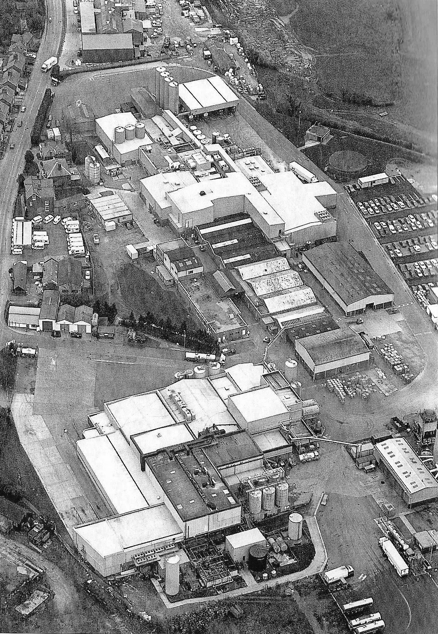 1995 (21st March) Aerial view of Minsterley. Photo: Clwyd-Powys Archaeological Trust. Mike Challinor comments "I worked there from 1964 to 1971, when I left to join the Shropshire Fire Brigade. I worked as a Maintenance fitter, mostly on the canning line until it closed on the same day as I got married, March 30th 1968. Although the canning line is no more our marriage has lasted 56 years and still going strong!! Albert Purslow was a guest at our wedding and made a speech when he said on showing me round on my first day I was Ok with the Pasteurisers and Homogenisers but didn't want to know anything about the sterilisers !!" (Courtesy Steve Rodenhurst)