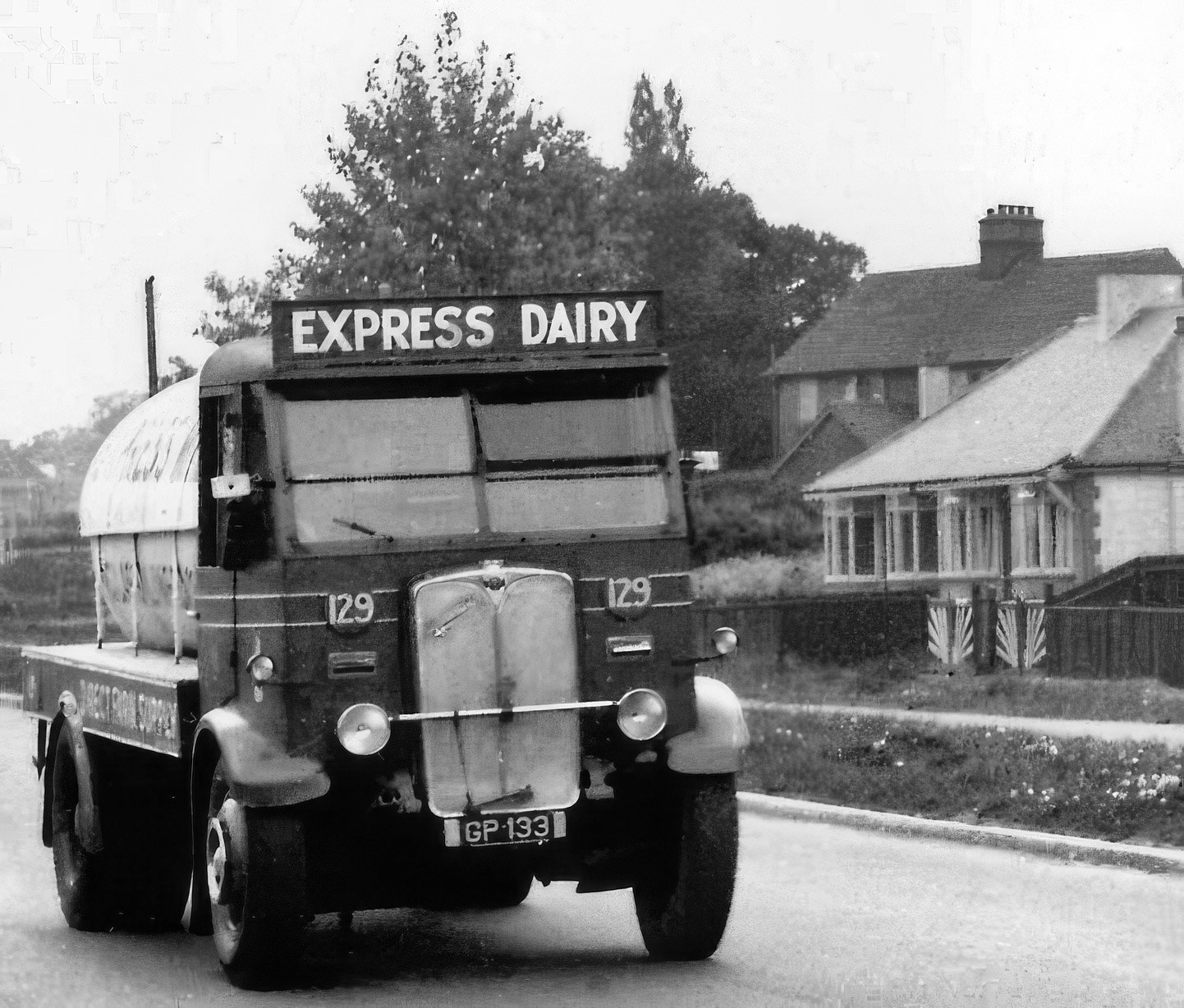 1934 AEC Mercury Express Dairy milk GP 133, Co: 129 tanker, possibly on its way to Bromley Processing. Robin Fraser Bell comments "I served that road a few times with my dad, later on the rider prams-used to drive on the service road /pavement you can see. Later on was served by Sidcup depot." (Courtesy Lloyd Rich)