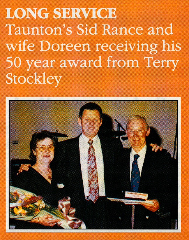 1991 Sid Raunce from Taunton Depot receives 50 year award from Terry Stockley. (1991 Summer Tops Magazine)