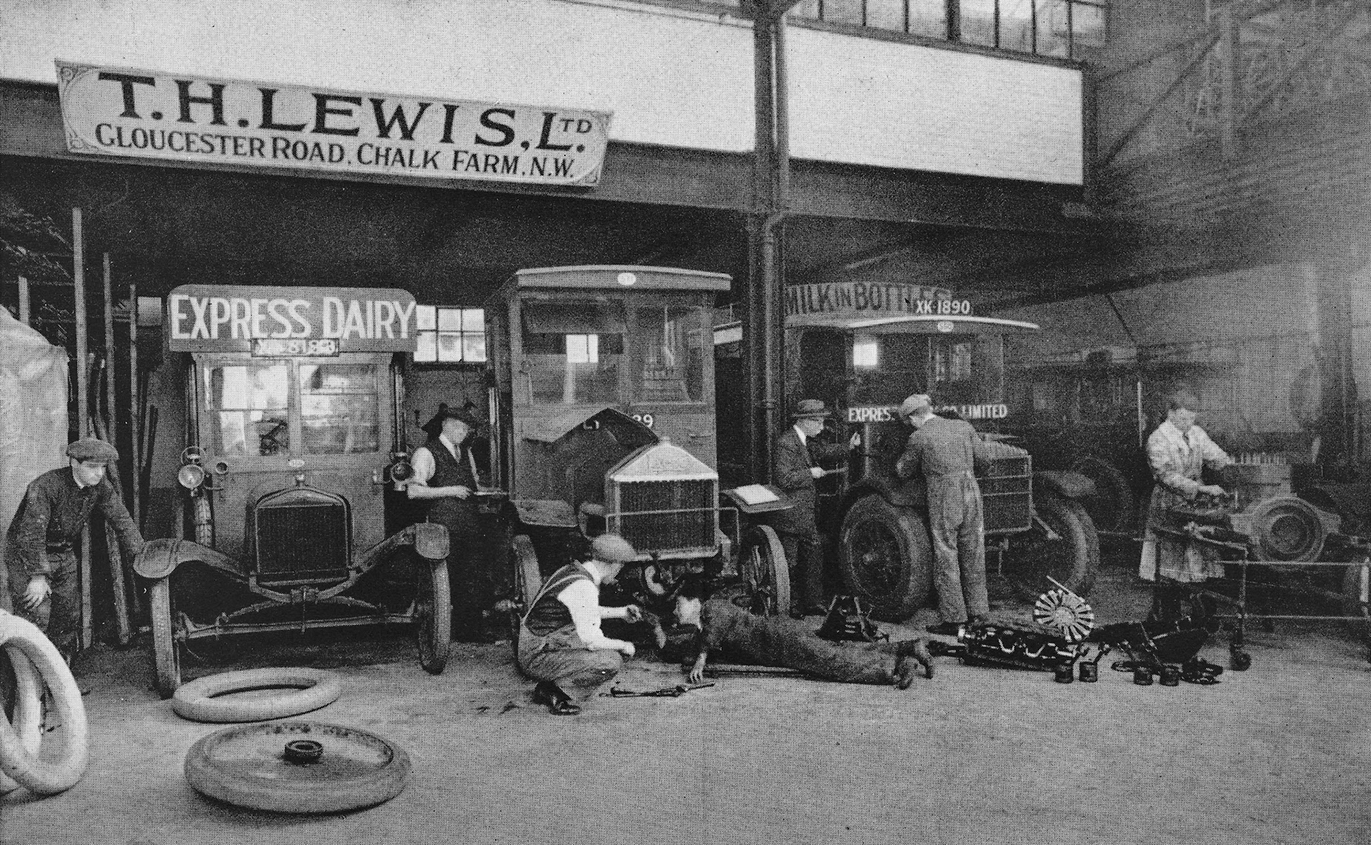1890's T.H. Lewis workshop at Gloucester Road, Chalk Farm. The Company was absorbed into Express in 1931, after previously making and maintaining Express vehicles for 50 years. Picture shows a Model T Ford, a Lacre and a Garford. (From Express Story 1864 - 1964)
