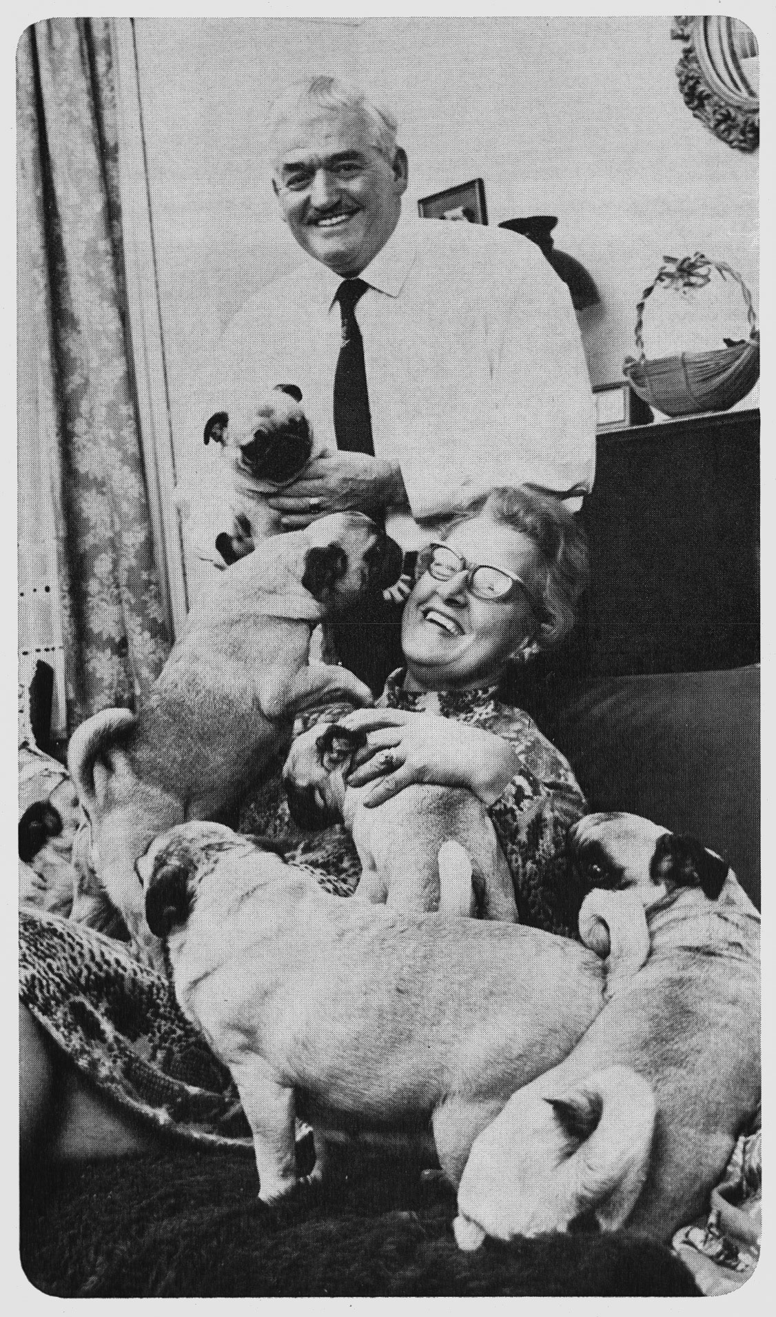 1972 Cricklewood dog lovers 'Taffy' and Diane Thomas at home. 'Taffy' worked on the dairy floor since 1937, and was Cricklewood Shop Steward and Brent Trades Council President. (Express News Spring)