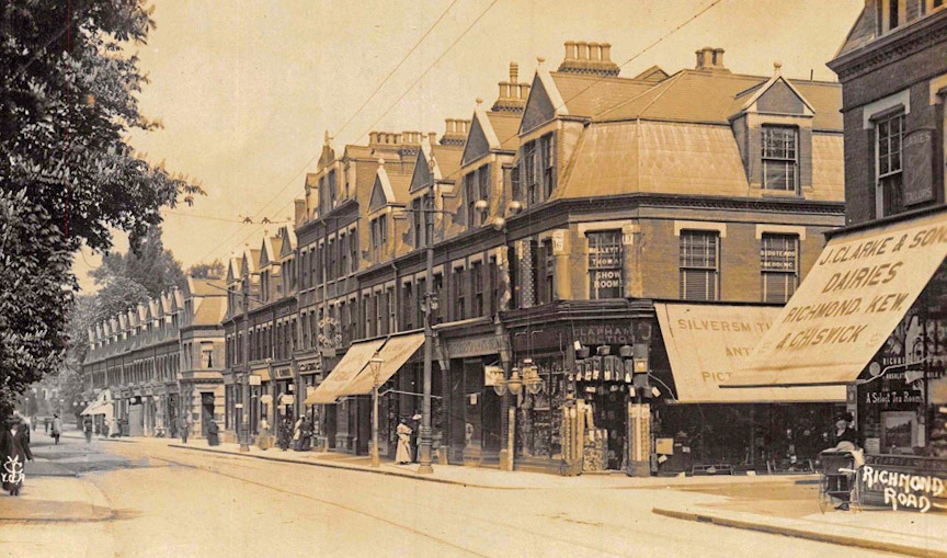 1900's J Clarke shop in East Twickenham. Paul Lelliott comments "The Express shop was just at the bottom of Richmond bridge; there also was one in St Margarets Road. Always doing run-outs to them." (Courtesy Twickenham Park Residents Association)