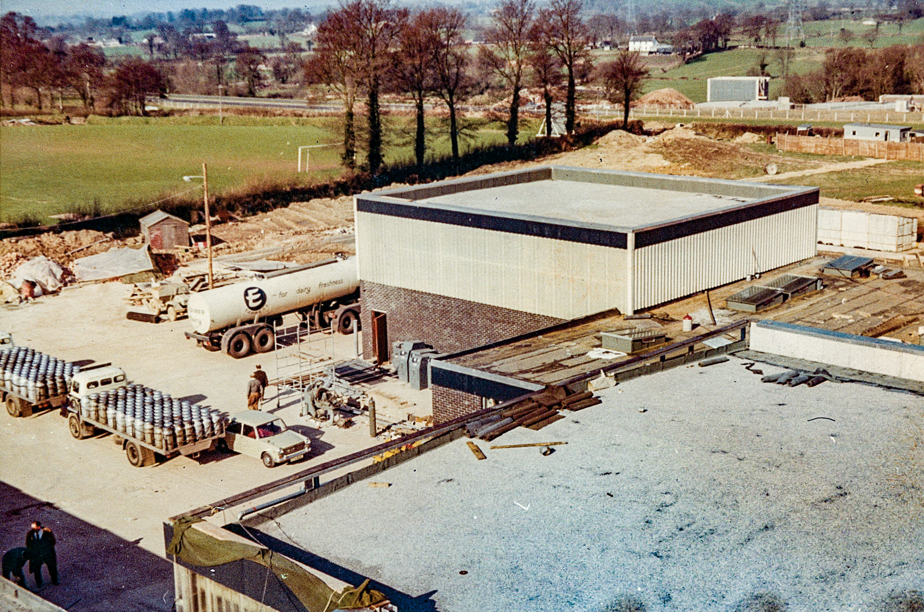 1969 Honiton-yard at end of covered way adjoining vehicle repair workshop. (From 'A Photographic Record of the Construction of the Creamery' by Bill Wilson (Courtesy Allhallows Museum, Honiton)