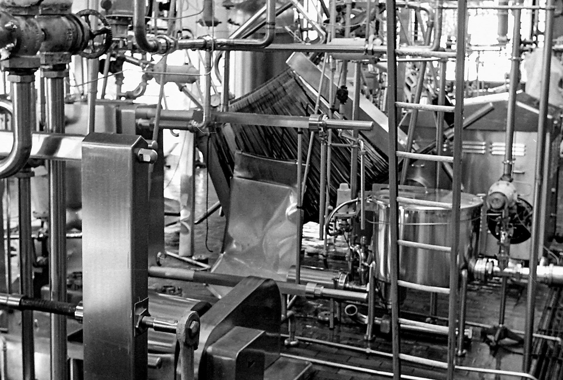 1970's Alfa-Laval UHT plant destroyed at South Morden. Philip Boyd comments "I saw the aftermath, it happened during the night. It was a build up of condensation in the heat exchanger plates. It went through the plate glass windows overlooking bottling hall." (Photographer Sam Jones)