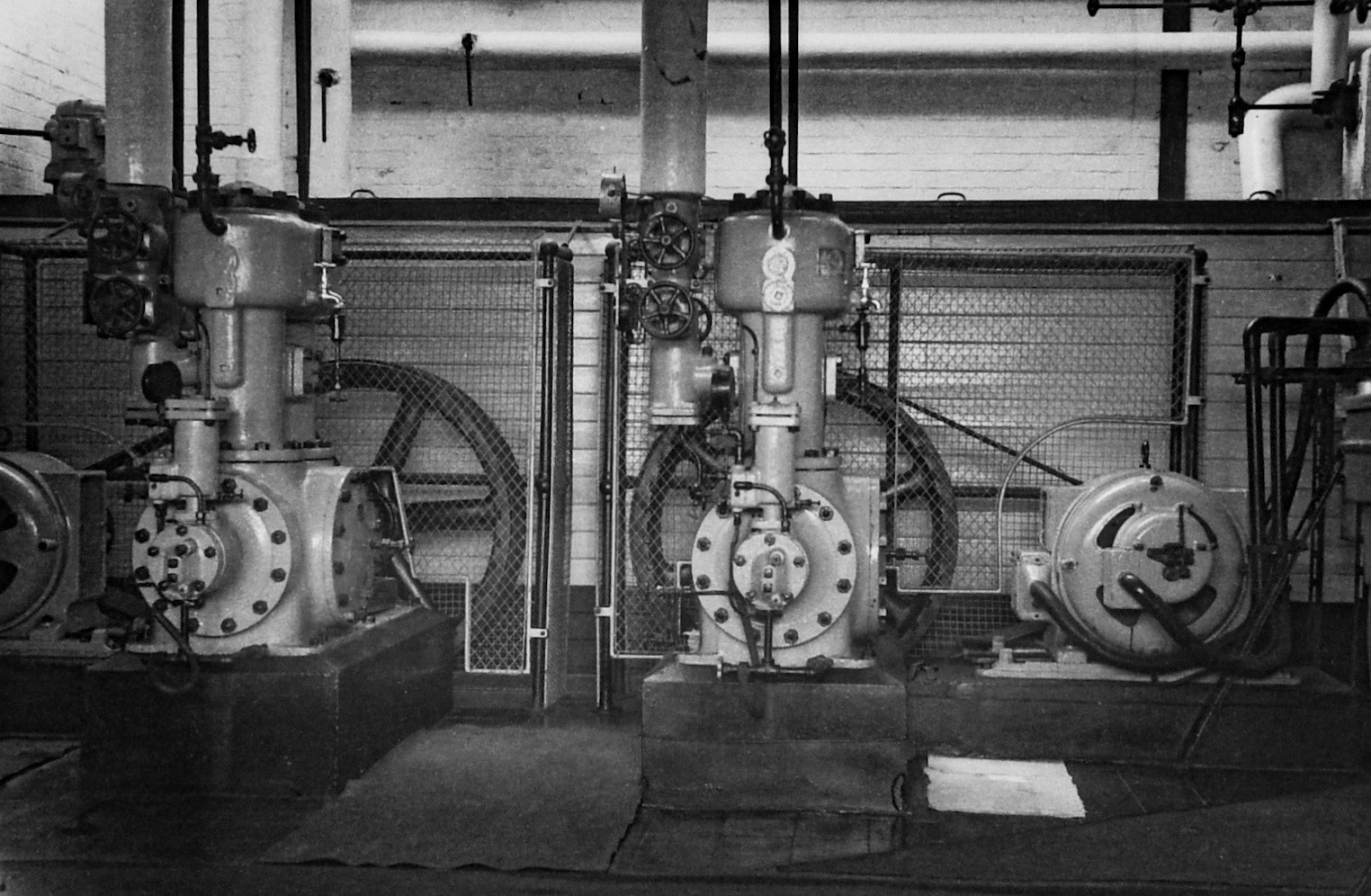 1950's Rowsley Dairy compressor room. (Courtesy Derbyshire Record Office, donated in March 1985; they had previously belonged to the donor's father, who was an electrical engineer with the dairy.)