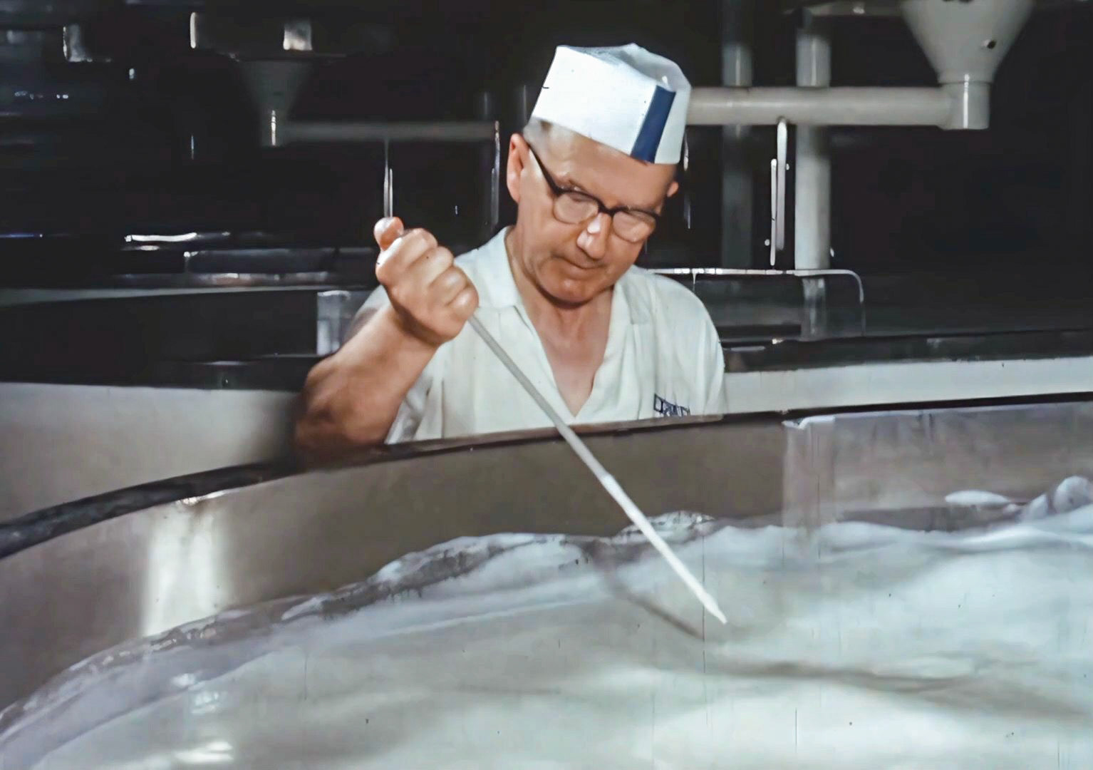 (Still from 'The Art of English Cheesemaking' video)