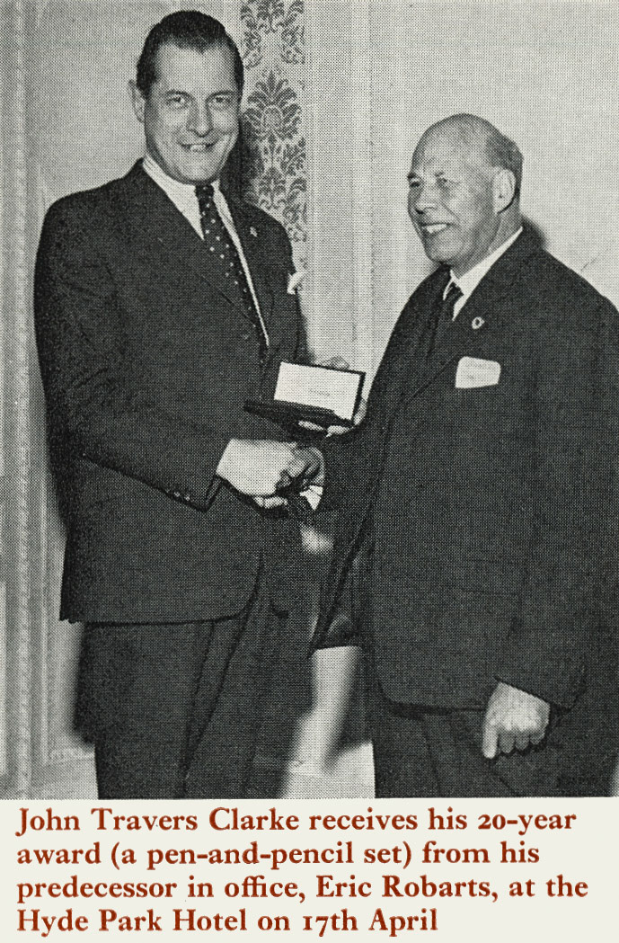 1974 John Travers Clarke presented with his 20-year award by Eric Robarts. (Express News Summer)