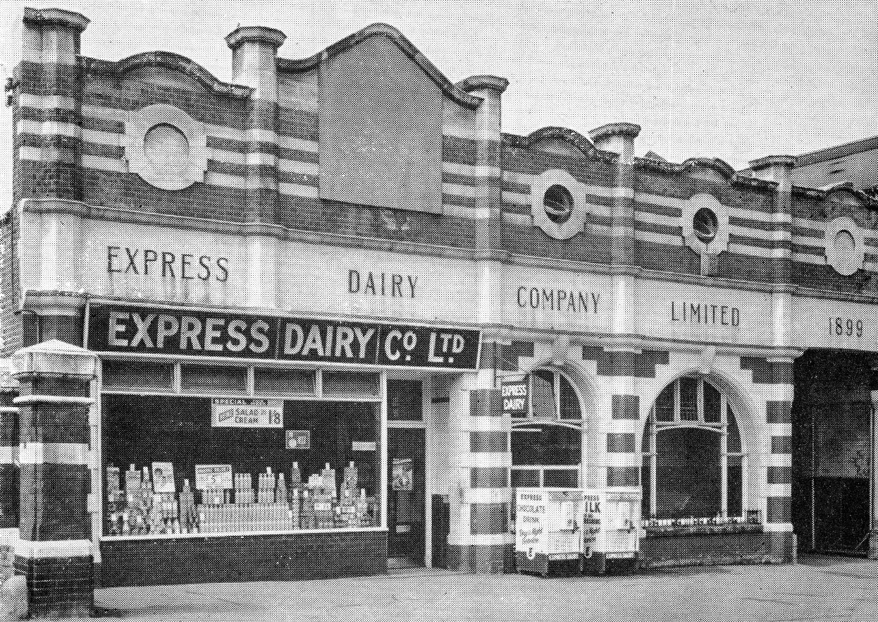 1950's? Herne Hill Shop and Depot at Rosendale Road. Stephen John Wills comments "Herne Hill depot had 26 retail and 1 semi-retail round, there was once a shop at front of building which became depot offices and servery, plus managers office. When the stables at the rear were renovated circa 1979, the offices moved there. Great depot and crew, also had a fantastic social club-great Saturday nights-and everyone turned up on Sunday for work." (From Express Story 1864 - 1964)