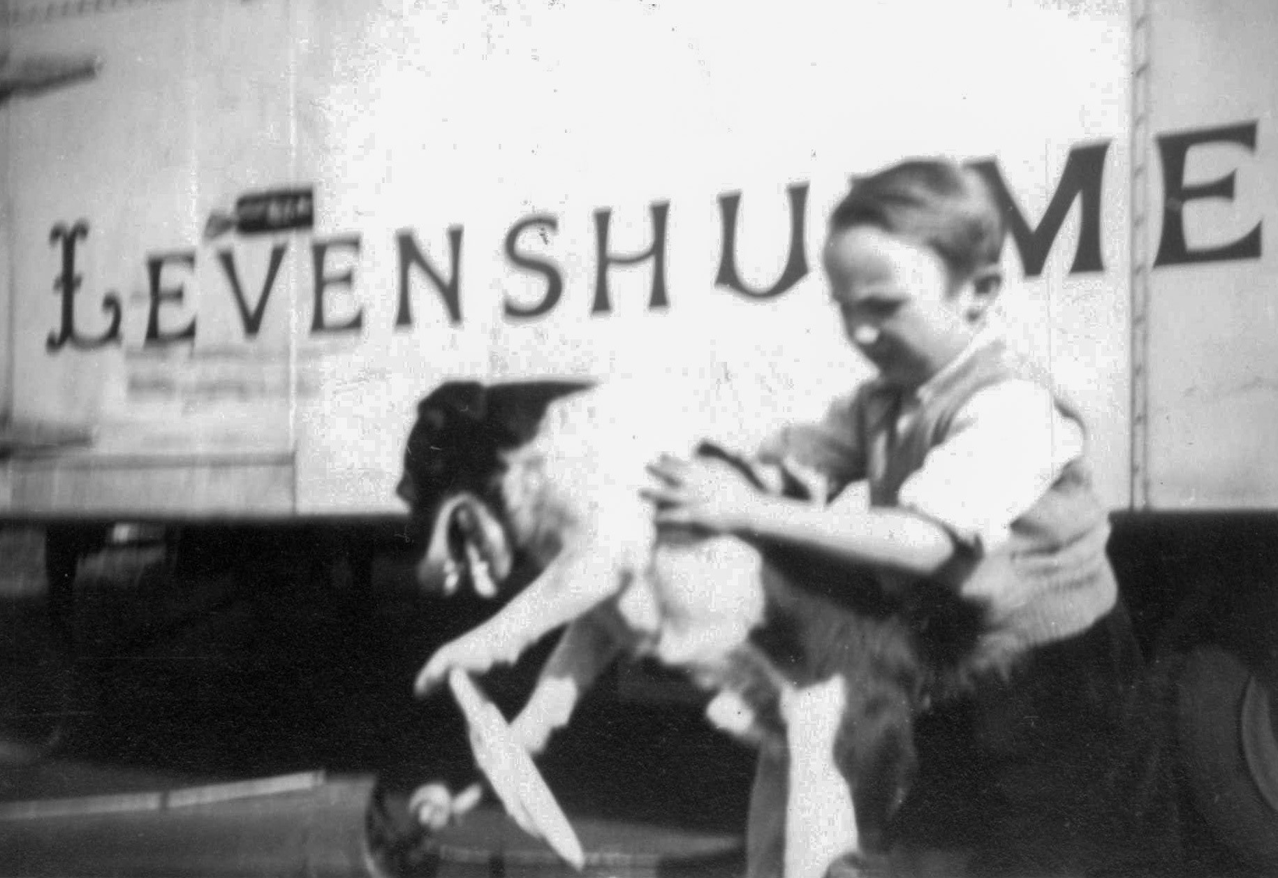 1950's "Peter McLouglin with 'Jack' the dog. The Dobson's watch dog?" (Courtesy George Nixon and Peter McLoughlin, Levenshulme History Then & Now)