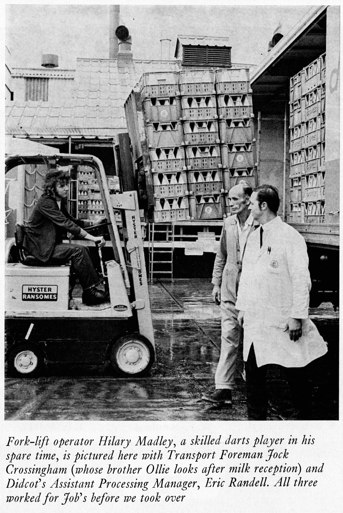 1972 Didcot forklift driver Hilary Madley with Transport Foreman Jock Crossingham and Eric Randell, Assistant Processing Manager using the new tine handling equipment to load crates.