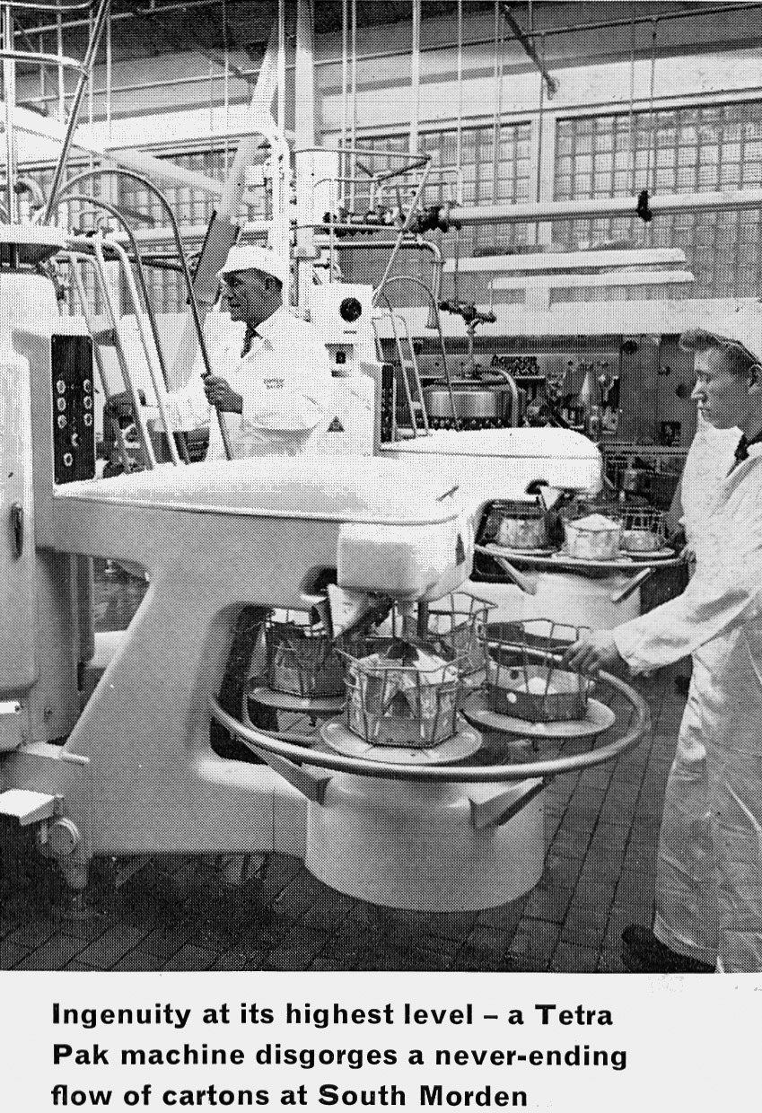 1963 TetraPak machine at South Morden. Extract from feature article by Raymond Seller, who joined Express to help edit 'Express News'. Peter Searle comments "I remember the hours of boredom on the TetraPak machines while working at the dairy during the summers from 1973 to 1976." Roger Frost adds "Those machines were used in the production of long life milk. As far as I know once packed it had to go into store for a while and then samples were tested for their quality. Several times I recall seeing what looked like hundreds of cartons being split open in the yard and the milk be poured down the drain." Peter Roper responded "Yes, they were quarantined prior to distribution to ensure that they didn't 'blow' through a failure of the aseptic process. However, UHT milk wasn't officially launched until 1965" (Express News Autumn)