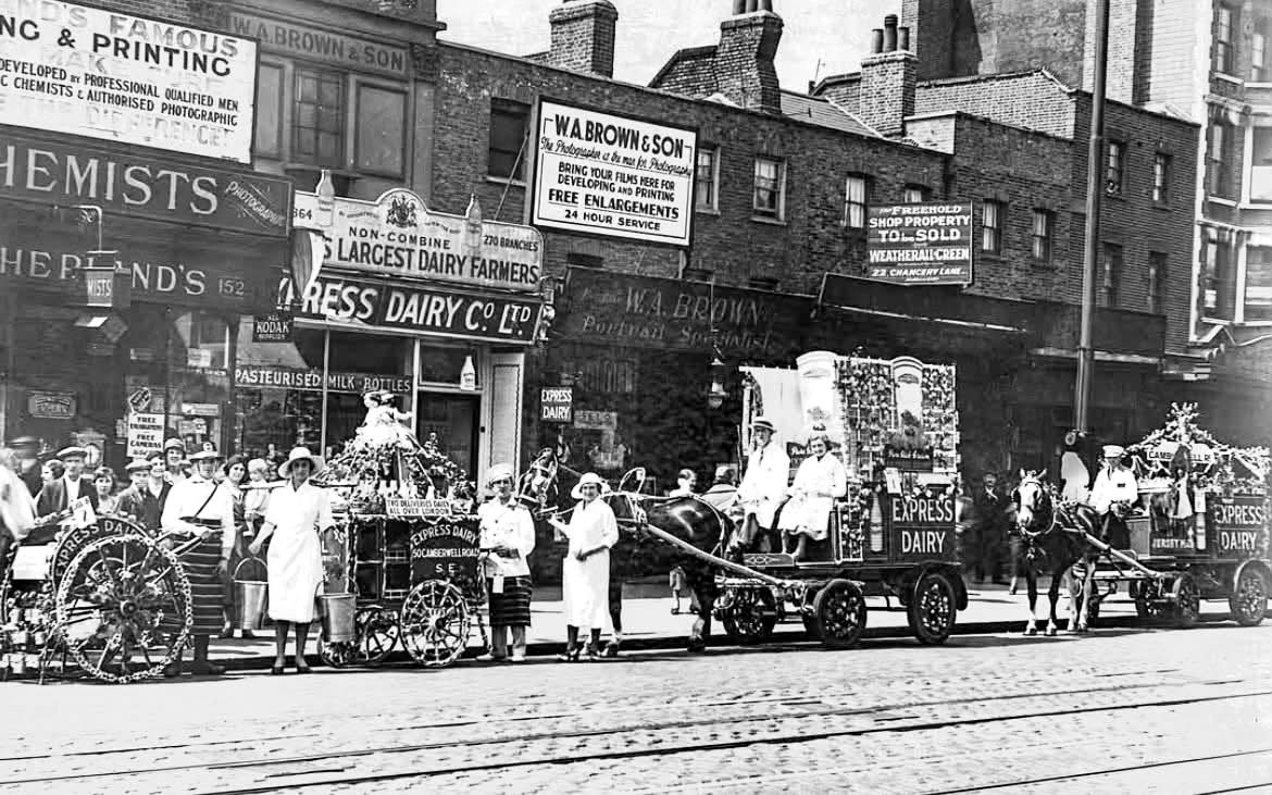 1934 Express Shop on Camberwell Road, SE5, displaying forms of delivery vehicles used over the years by staff. (Courtesy Roger Riddall)