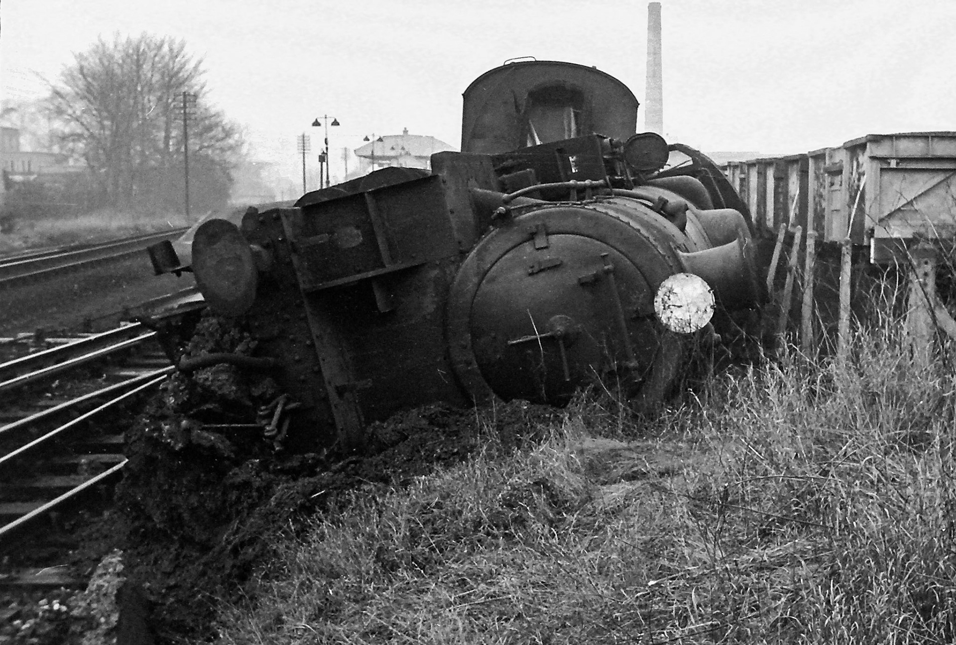 1966 South Morden. BR Standard Class 4 Tank 80141 jumped the points with a load of empty tanks, closing the line and siding for 48 hours. (Photographer Sam Jones)
