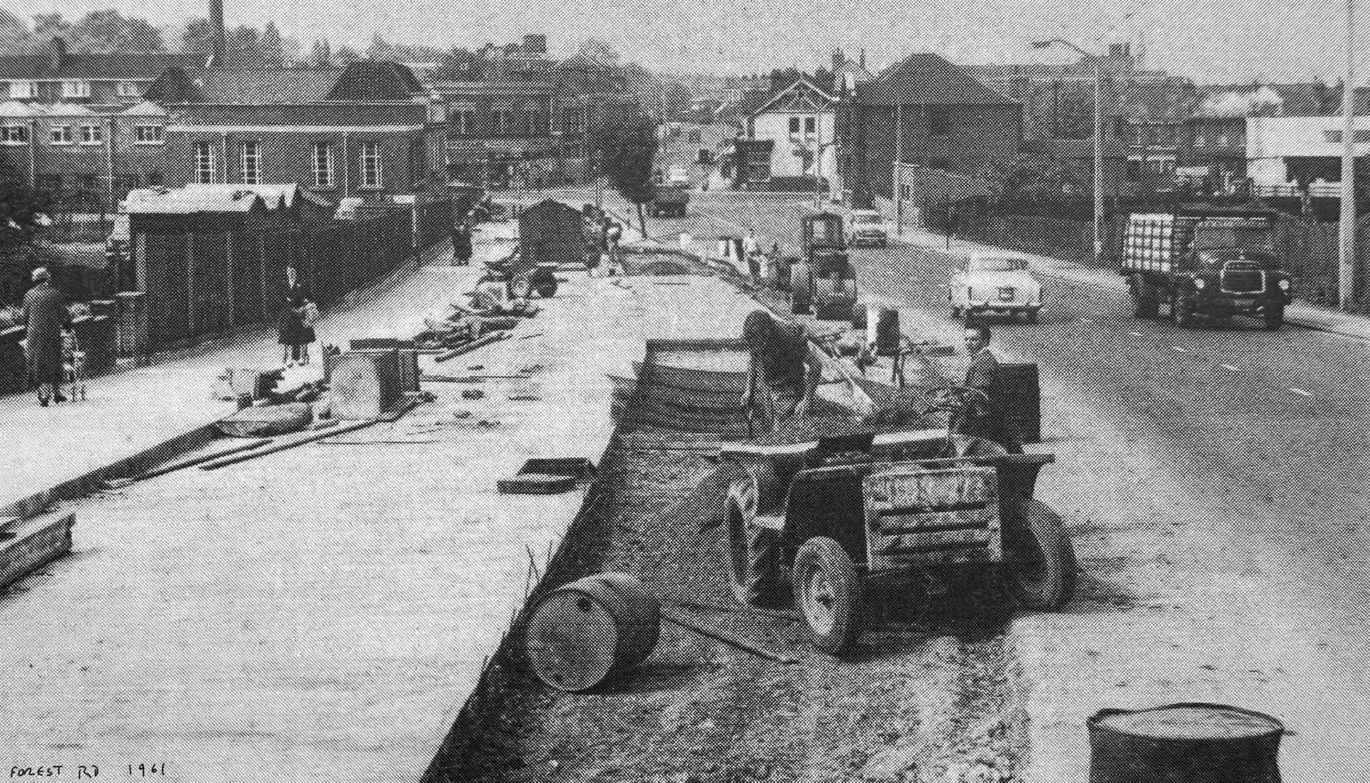1961 Forest Road, Walthamstow during widening works; the Bedford belonged to ‘Milk Vessels Recovery Ltd’ who moved empty glass milk bottles around. Their base was inconveniently located at the end of a road at Tottenham Hale virtually buried inside the vast Gestetner factory. (Courtesy Peter John Morris, FB)